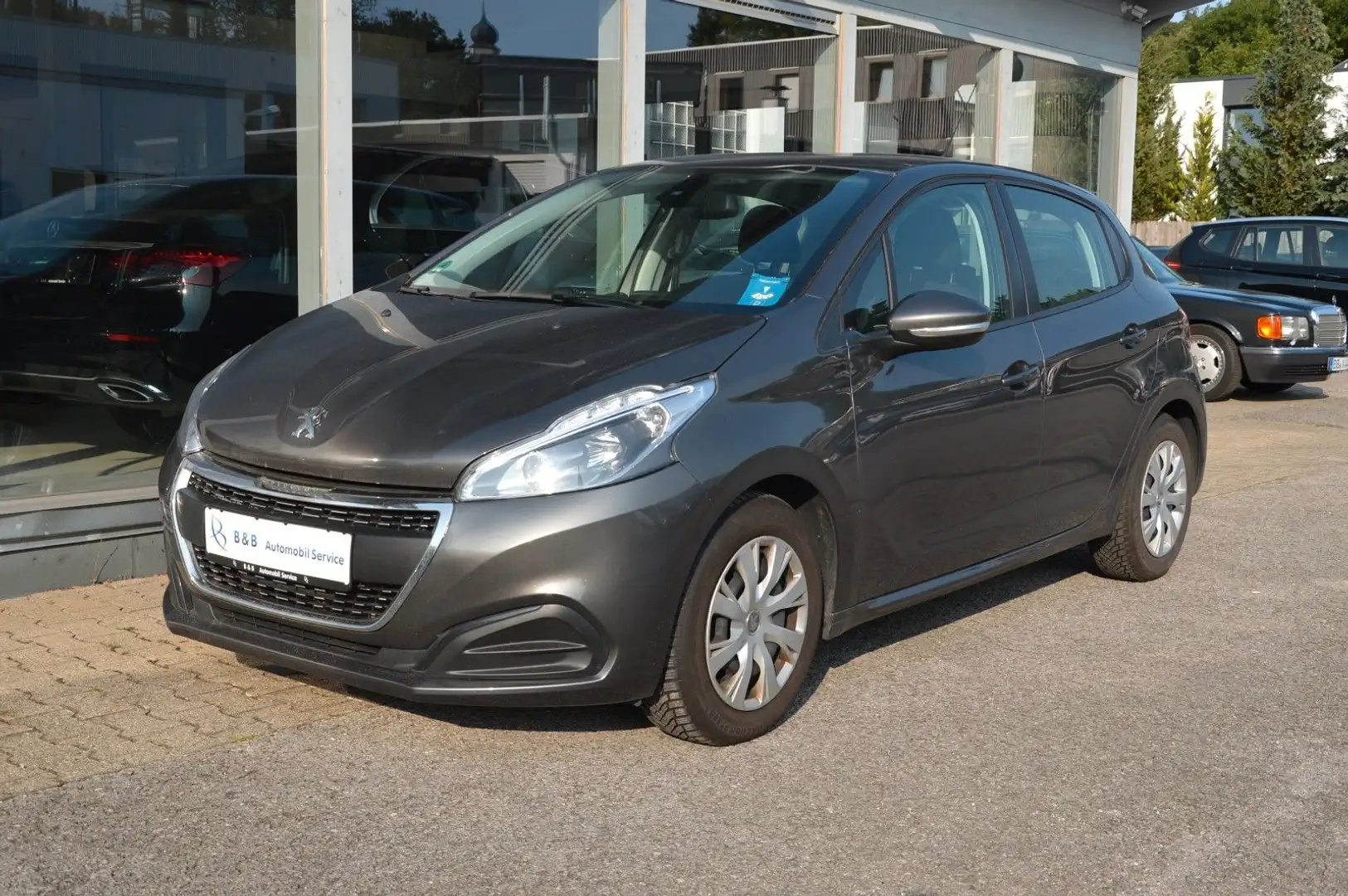 Peugeot 208 Active 1.2*5Trg.*KLIMA*PDC*SHZ*NAVI*CAM*TEMP Gris - 1