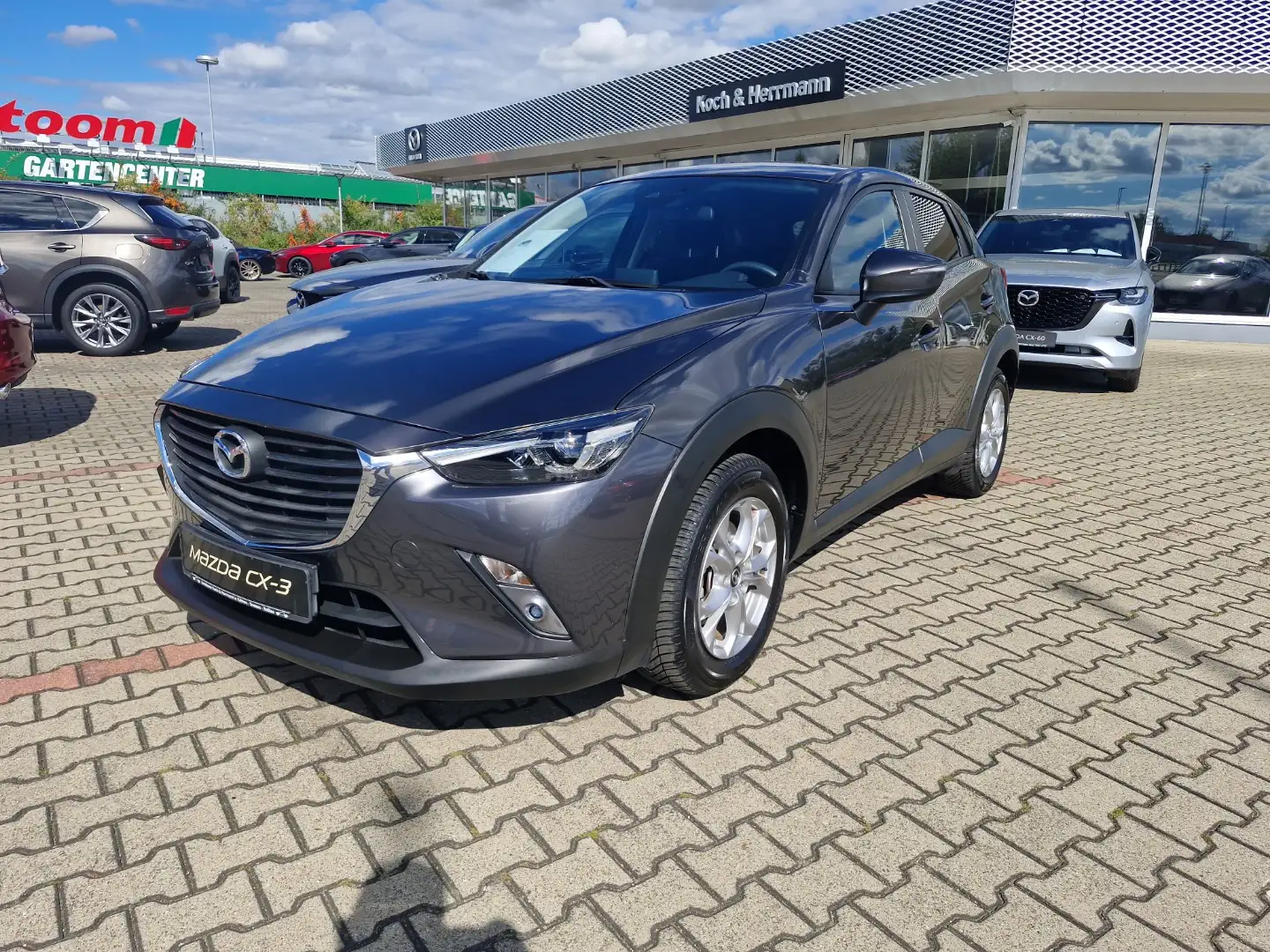 Mazda CX-3 SKYACTIV-G 120 Exclusiveline Allwetterreifen neu Grau - 1