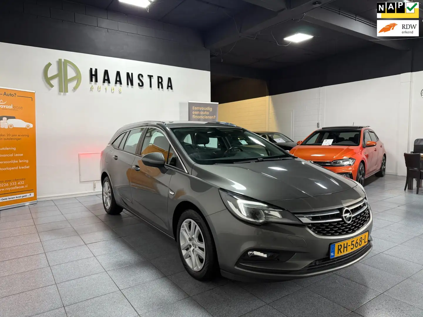 Opel Astra Sports Tourer 1.4 Online Edition Turbo 150 PK Navi Grijs - 1