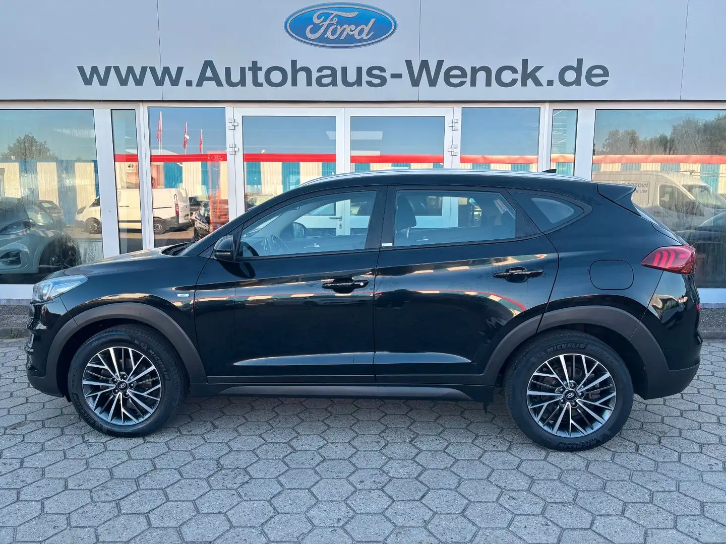 Hyundai TUCSON Mild-Hybrid*1.HAND*NAVI*ATM 1000 KM* Schwarz - 1