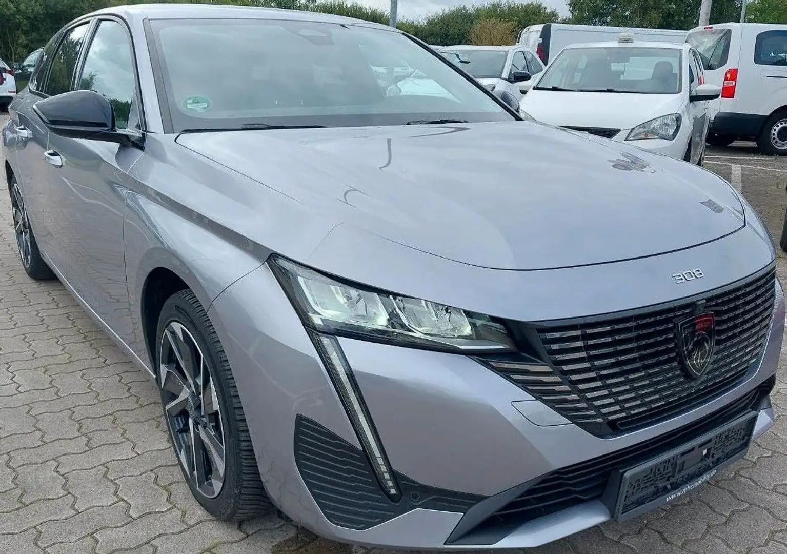 Peugeot 308 1,5BlueHDi Klima SHZ Navi PDC+Kamera LMF AHK Grijs - 1