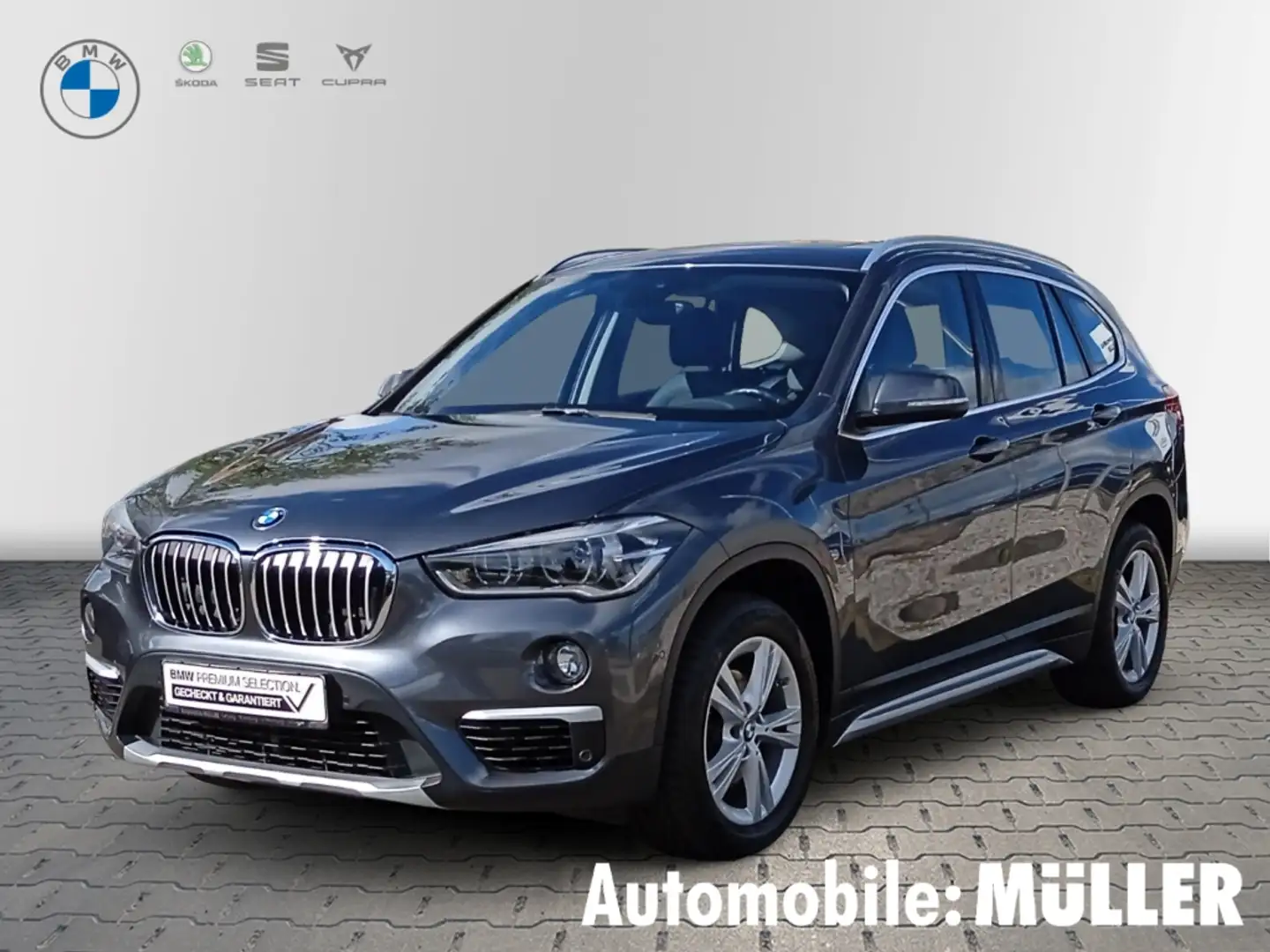 BMW X1 sDrive18i X-Line AHK-abnehmbar El. Panodach Navi L Grijs - 1