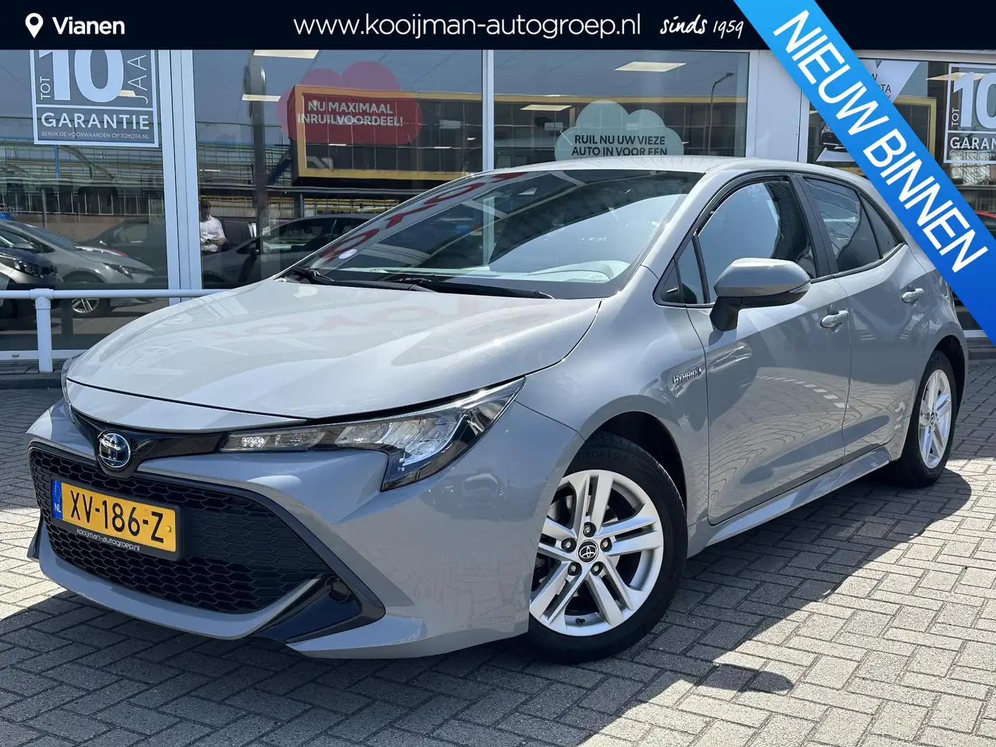 Toyota Corolla 1.8 Hybrid Active Grijs - 1
