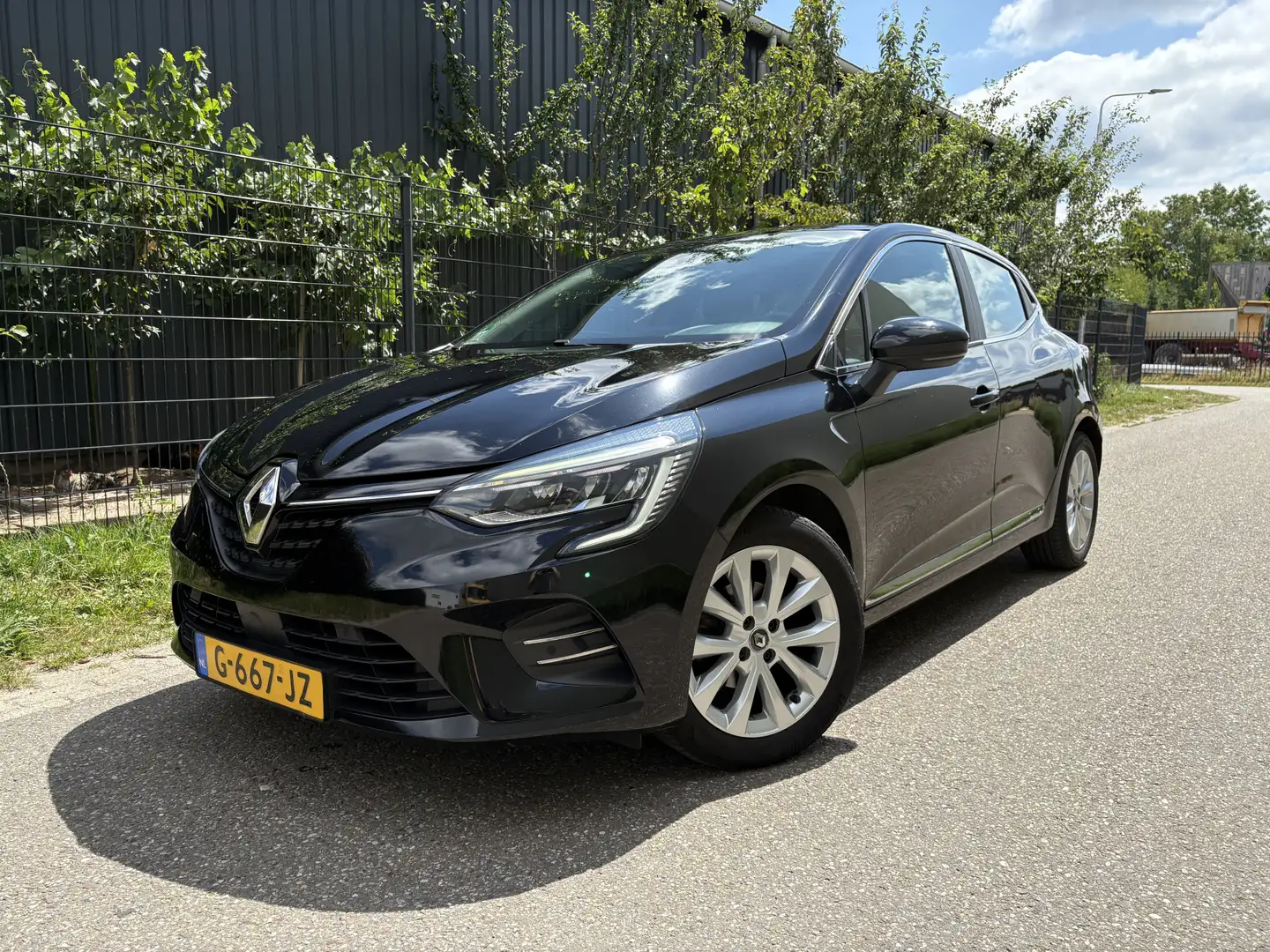 Renault Clio 1.0 TCe Intens / NAVI / CRUISE / HALF LEER / INCL Zwart - 1