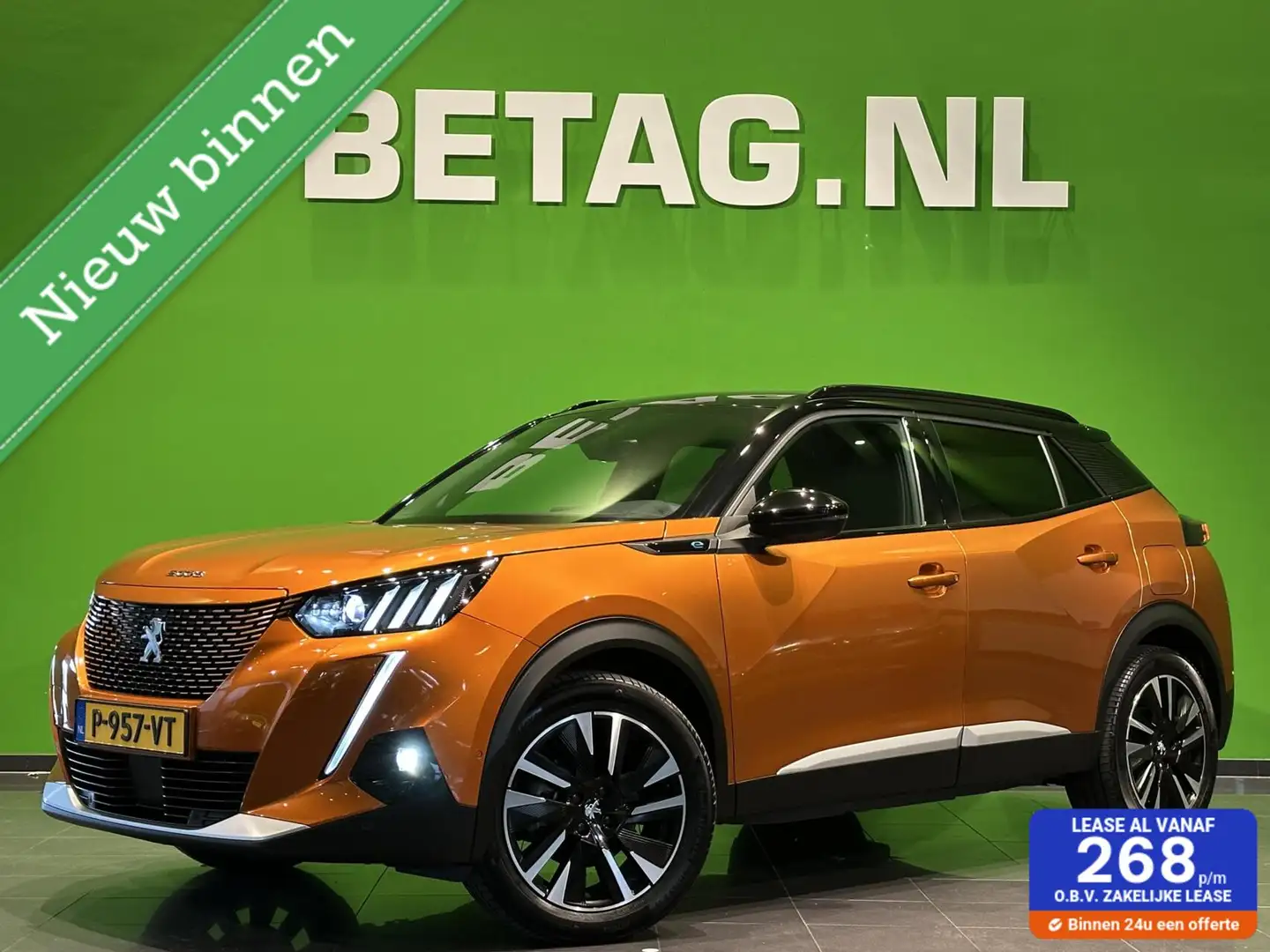 Peugeot e-2008 EV GT Pack 50 kWh | Schuif/kantel dak | Oranje - 1