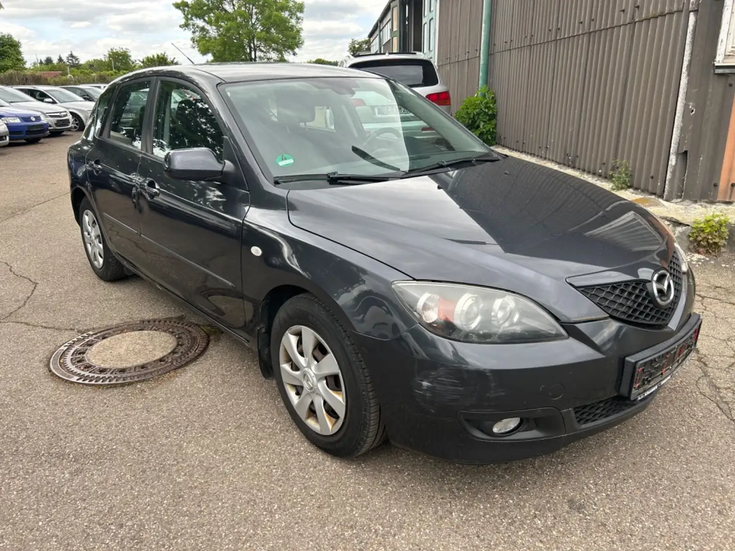 Mazda 3 Lim. 1.6 Sport Active Grau - 1