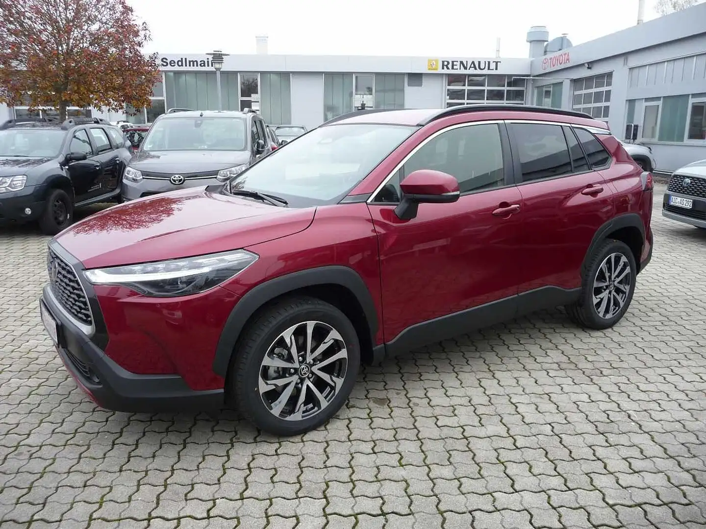Toyota Corolla Cross 1.8 Hybrid Style Navi, Alu, el. Heckklappe Rouge - 1
