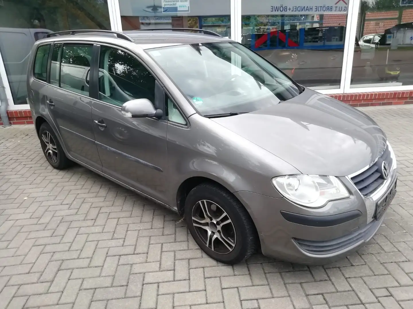 Volkswagen Touran 1.9 TDI DPF Conceptline /7-Sitzer/AHK/Met./1. Hd. Grau - 1