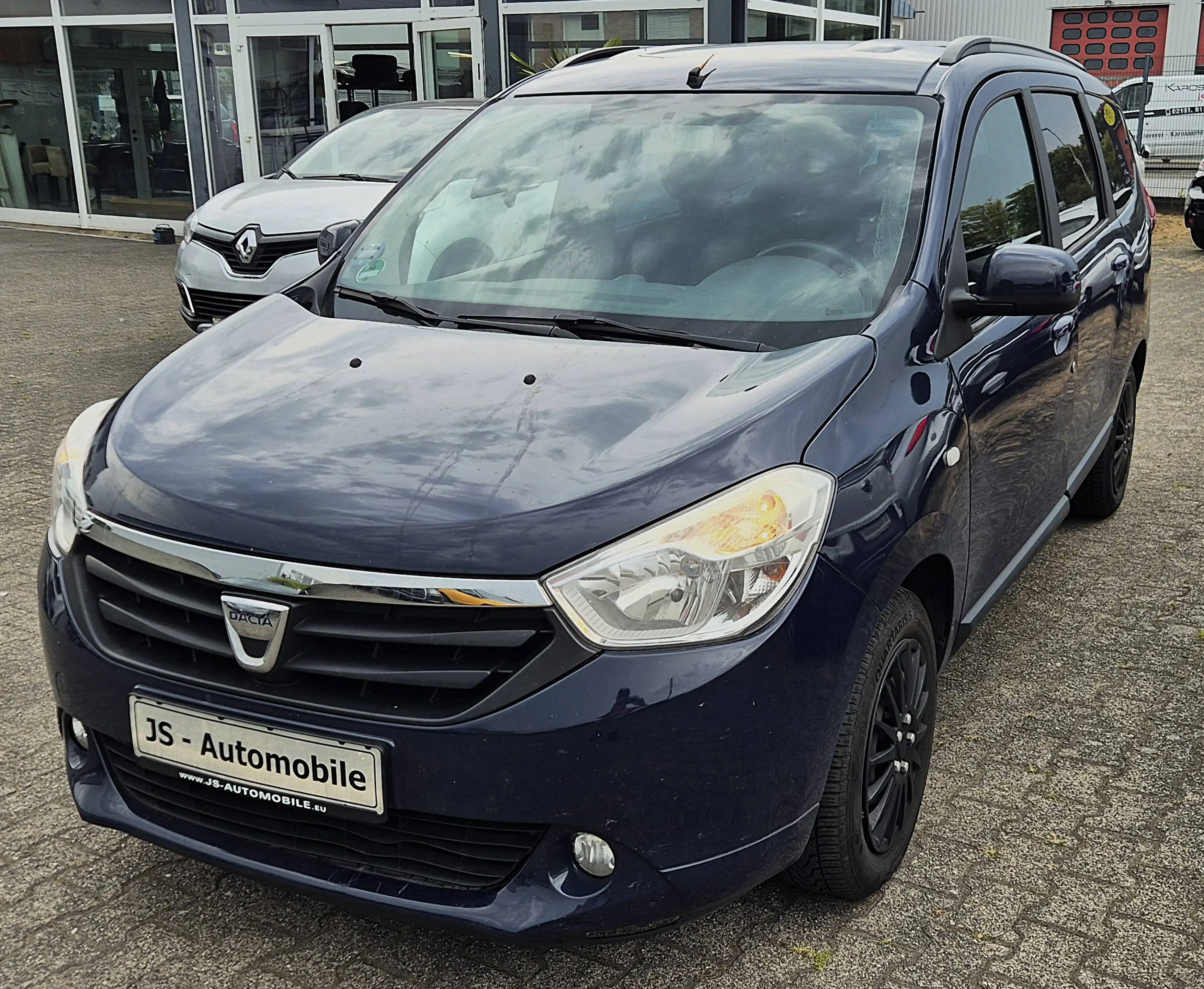 Dacia Lodgy LAUREATE 1,6i 7SITZER KLIMA NAVI RÜCKFAHRKAMERA PDC SHZ ALLWETTER 2HD