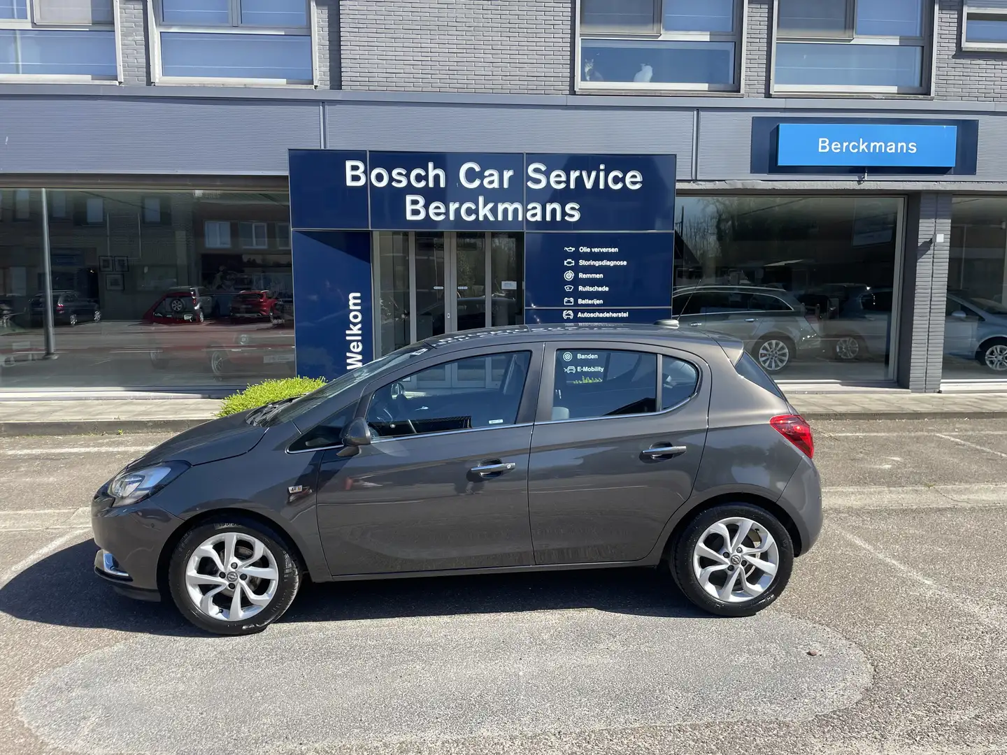 Opel Corsa-e Cosmo 1.2 B Grijs - 1