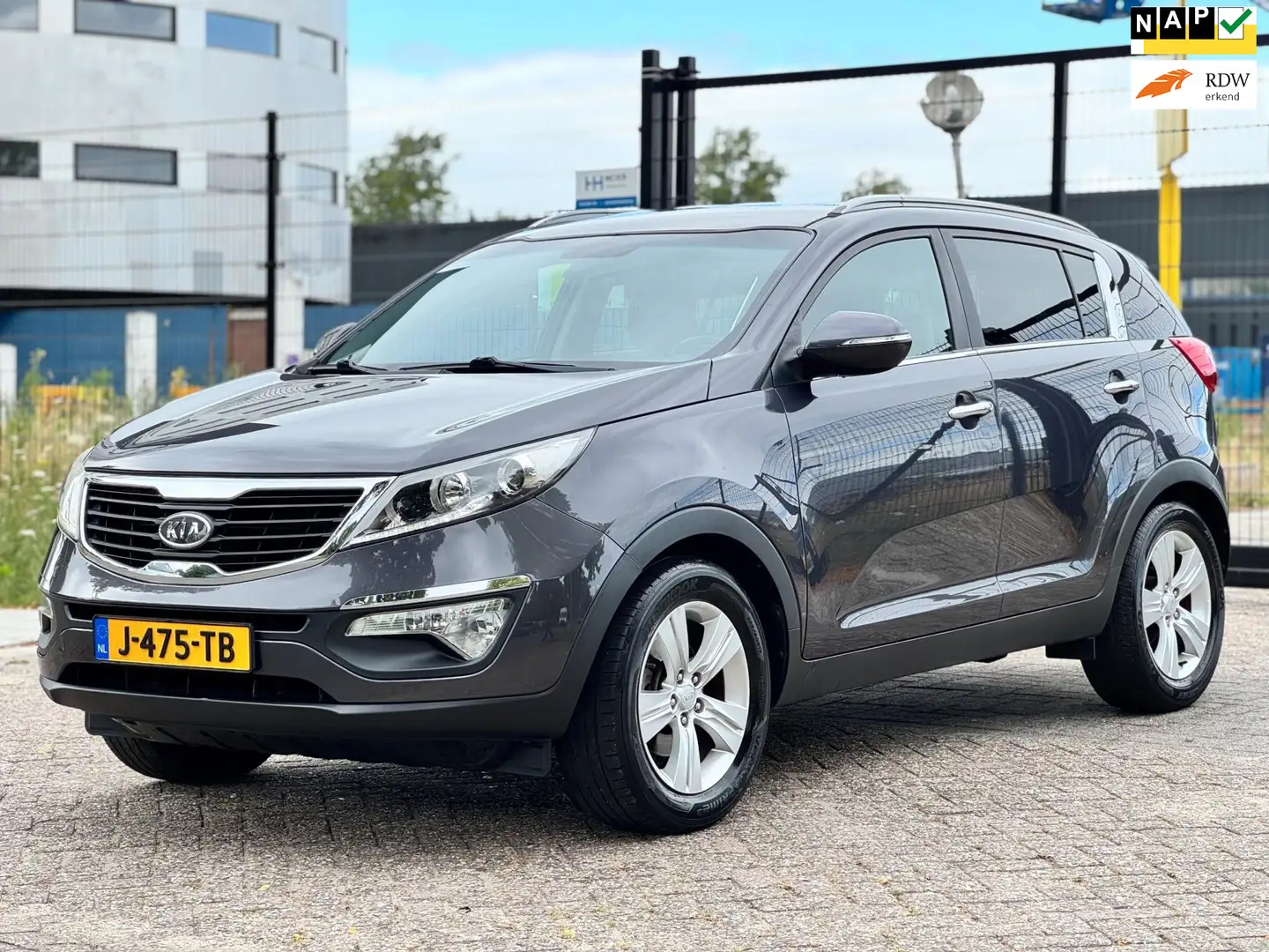 Kia Sportage 1.6 GDI ISG X-ecutive Plus Pack Grijs - 1