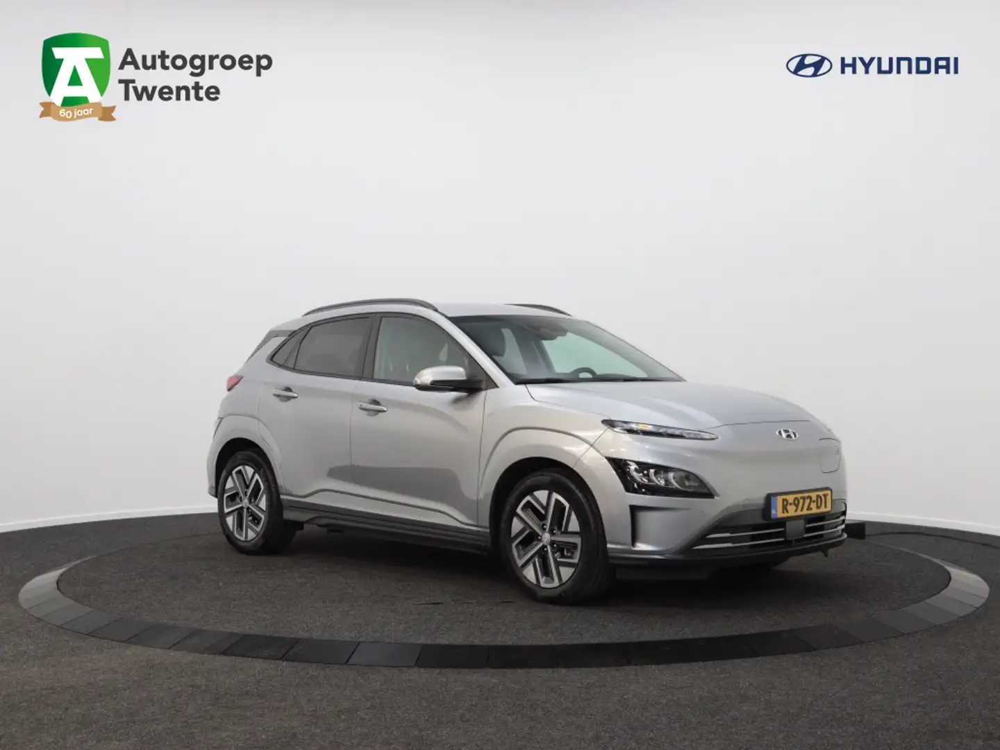 Hyundai KONA EV Premium 64 kWh | 3 Fase | Leder | Navigatie | C Grijs - 1