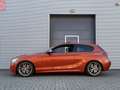 BMW 135 1-serie M135i xDrive High Executive I Aut. I 320PK Orange - thumbnail 3