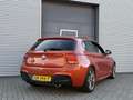 BMW 135 1-serie M135i xDrive High Executive I Aut. I 320PK Orange - thumbnail 5