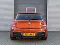 BMW 135 1-serie M135i xDrive High Executive I Aut. I 320PK Orange - thumbnail 4