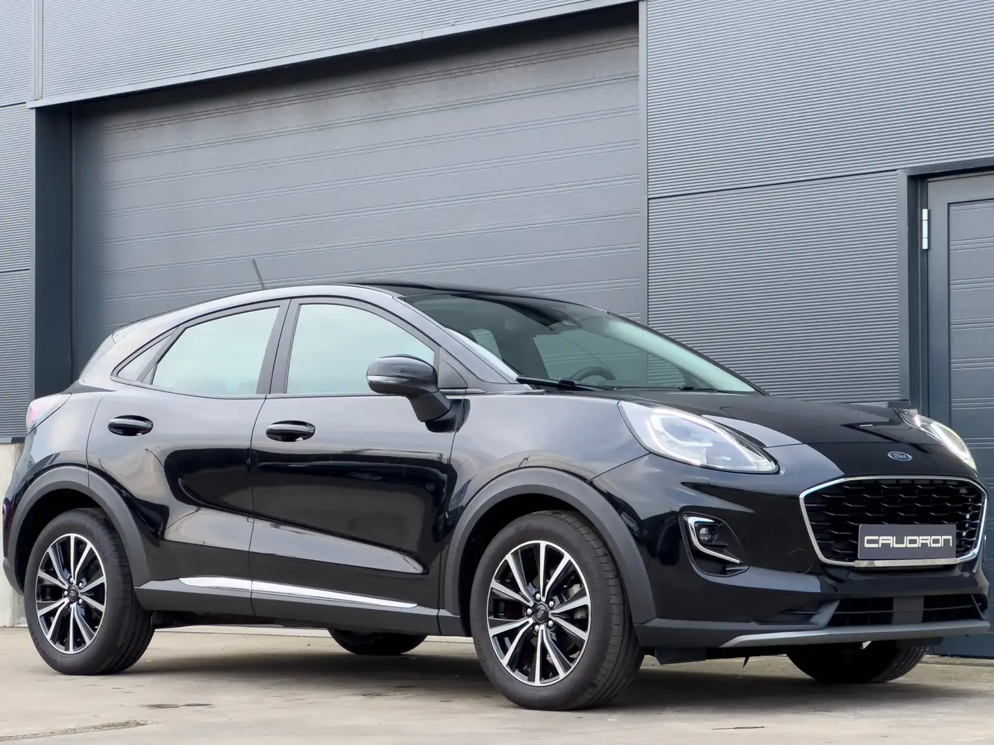 Ford Puma 1.0 EcoB. 125pk Hybrid Titanium | SUV | Garantie Zwart - 1