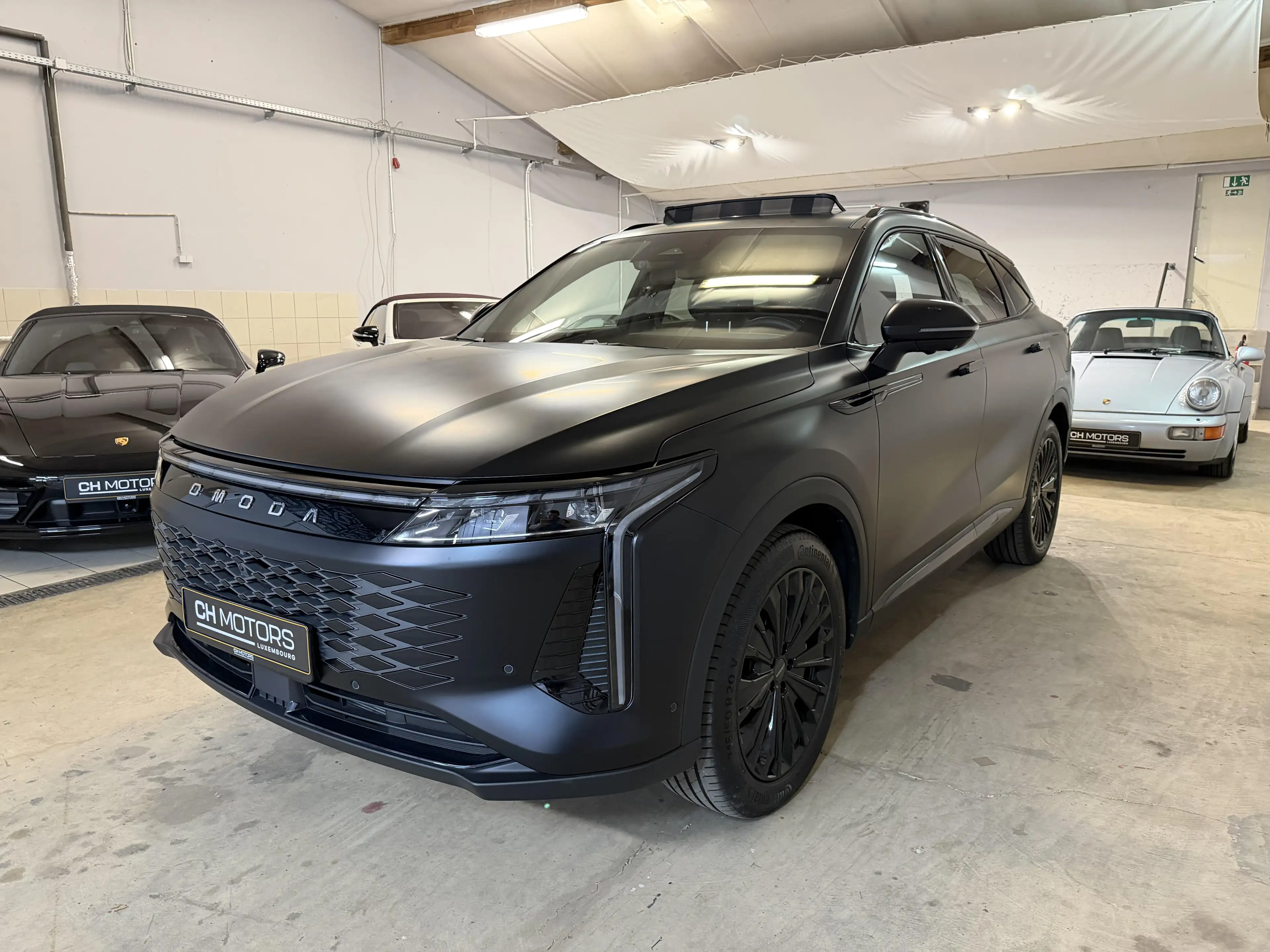 Omoda 9 SHS AWD PHEV Premium Black Edition — photo 3