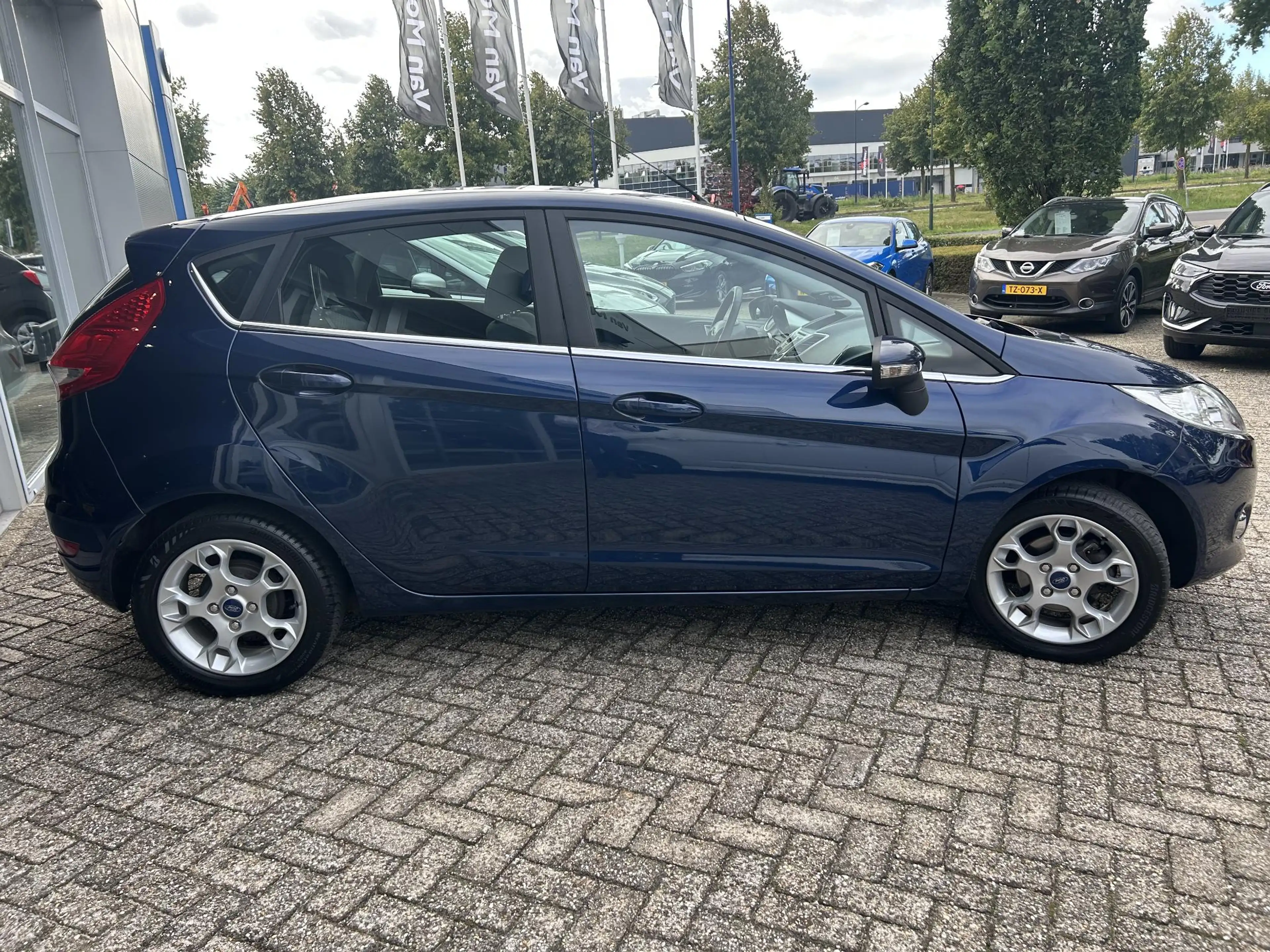 Ford Fiesta 1.25 Titanium — photo 6