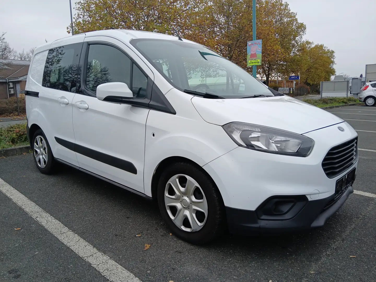 Ford Transit Courier 1.5 TDCI,5Sitzer,1.Hand,Klima,PDC,Unfallfrei Weiß - 1
