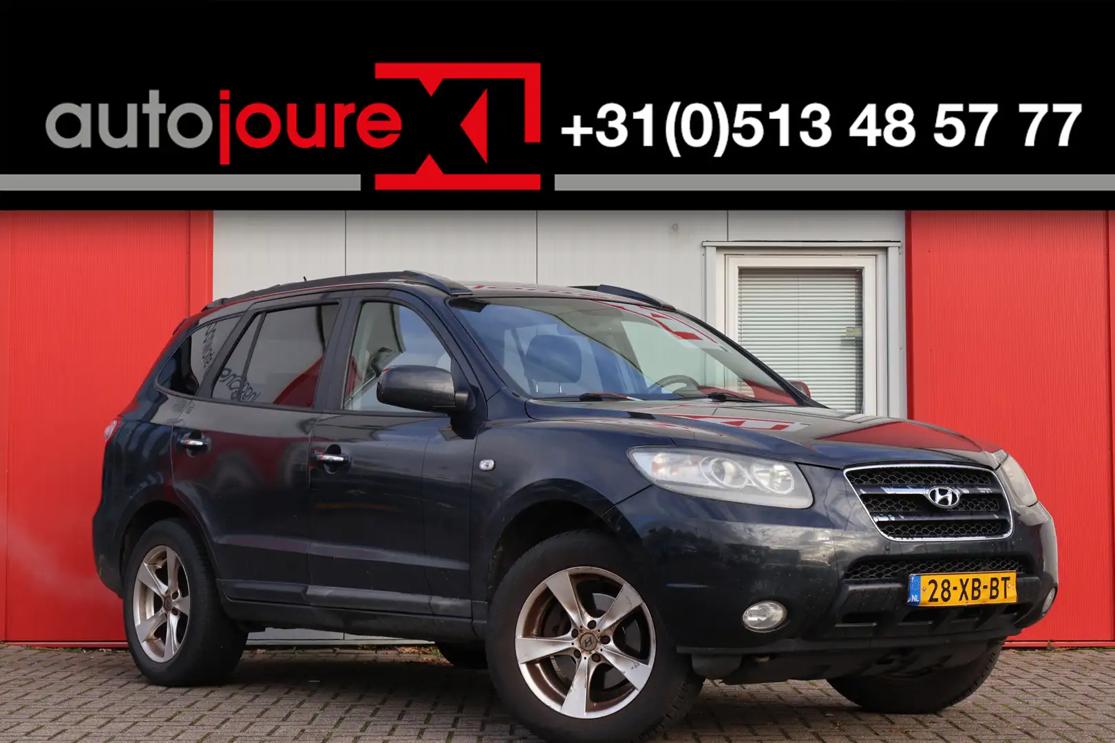 Hyundai SANTA FE 2.7i V6 Style 7p. | Origineel NL | Climate Control Noir - 1