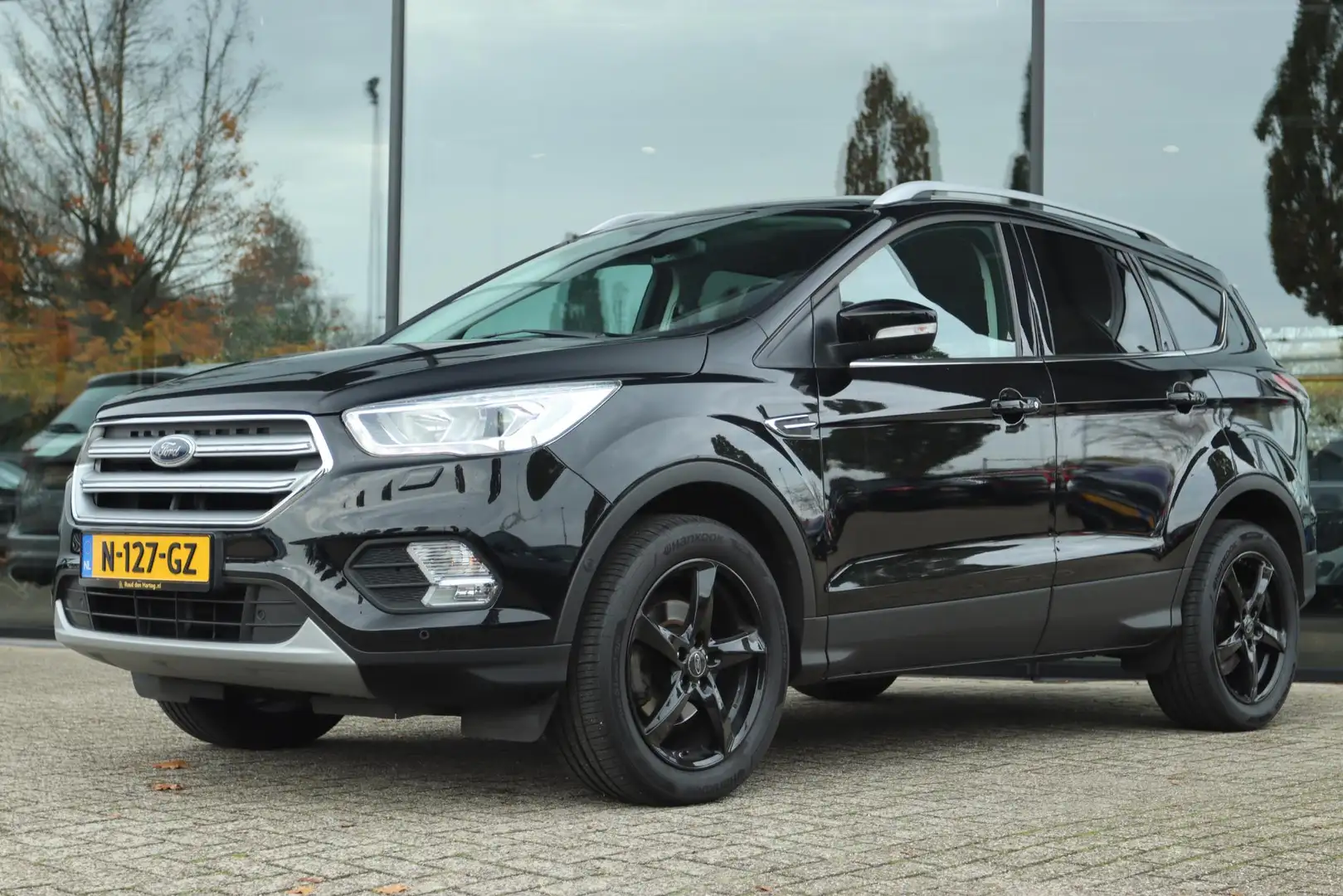 Ford Kuga 1.5 ECOBOOST TITANIUM | TREKHAAK | WINTER PACK | C Noir - 1