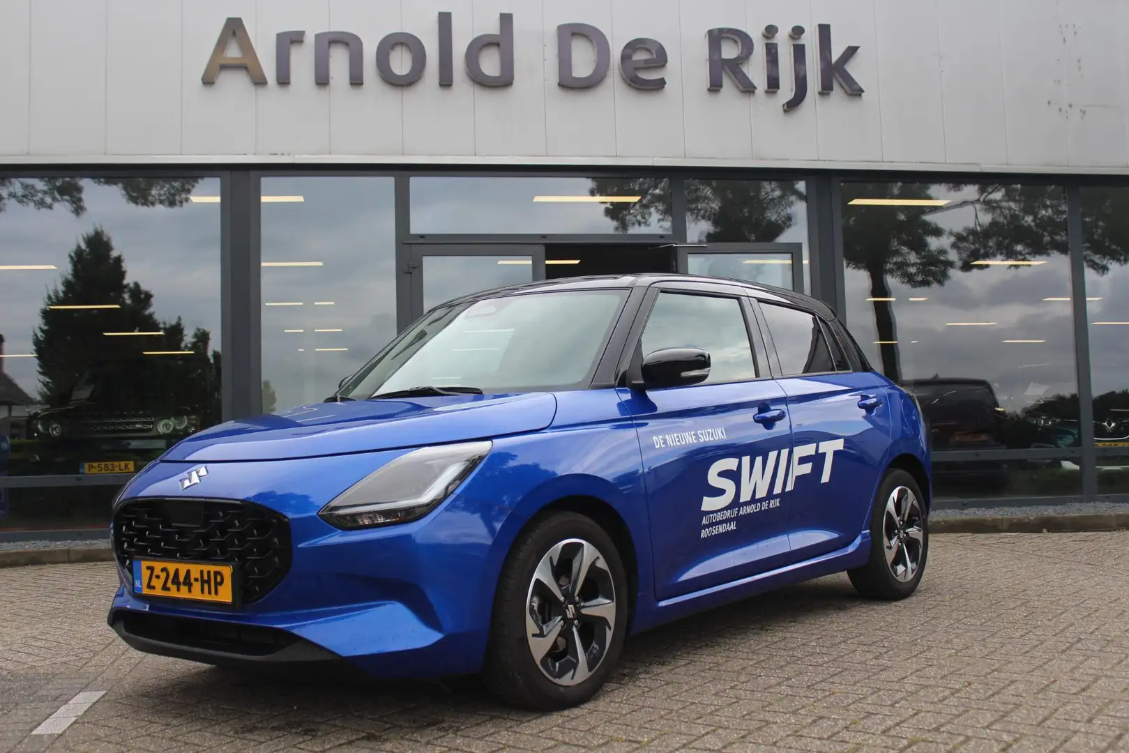 Suzuki Swift 1.2 Style Smart Hybrid Blauw - 1