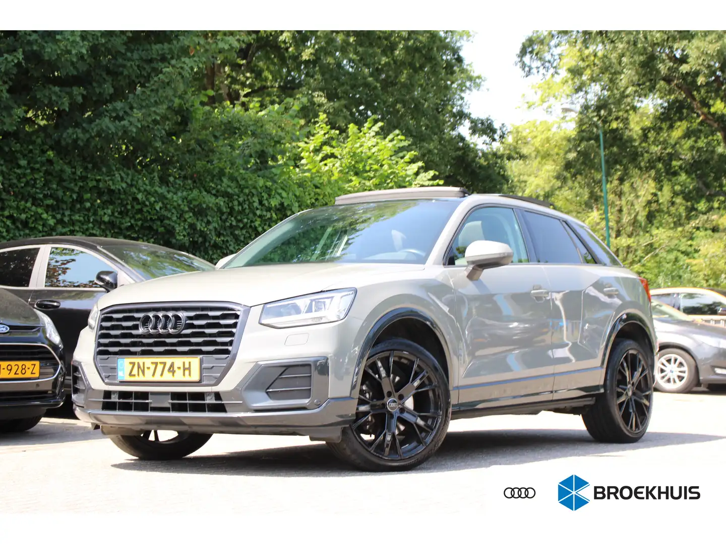 Audi Q2 1.4 TFSI CoD DESIGN PRO LINE PLUS AUTOMAAT | PANO Grijs - 1