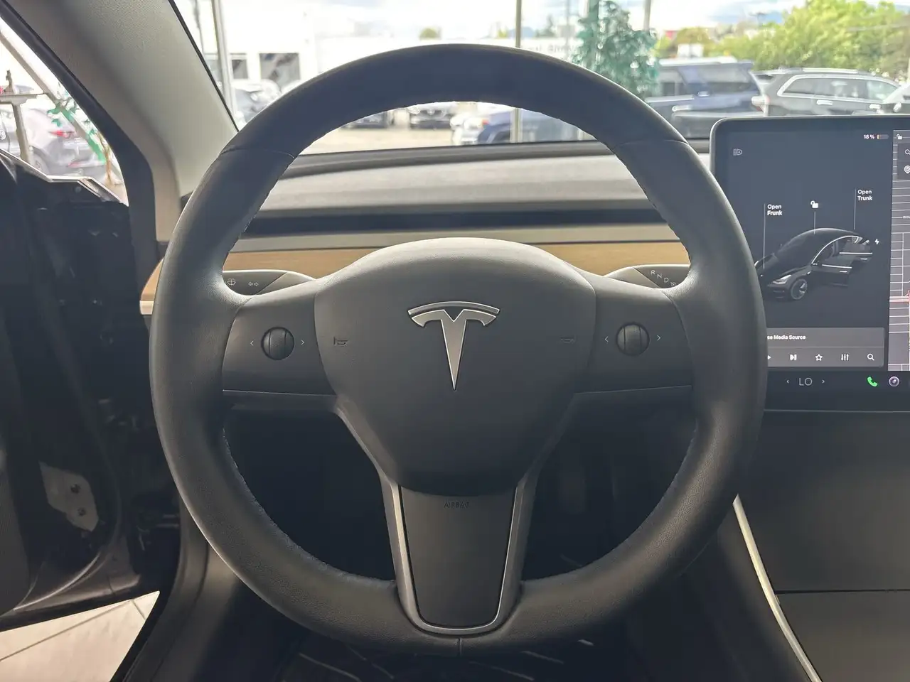 Tesla Model 3 photo Tesla Model 3