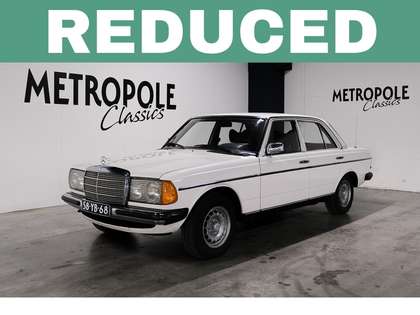 Mercedes-Benz 230 Automaat . Schuifdak. In het klassiek wit(737). 19