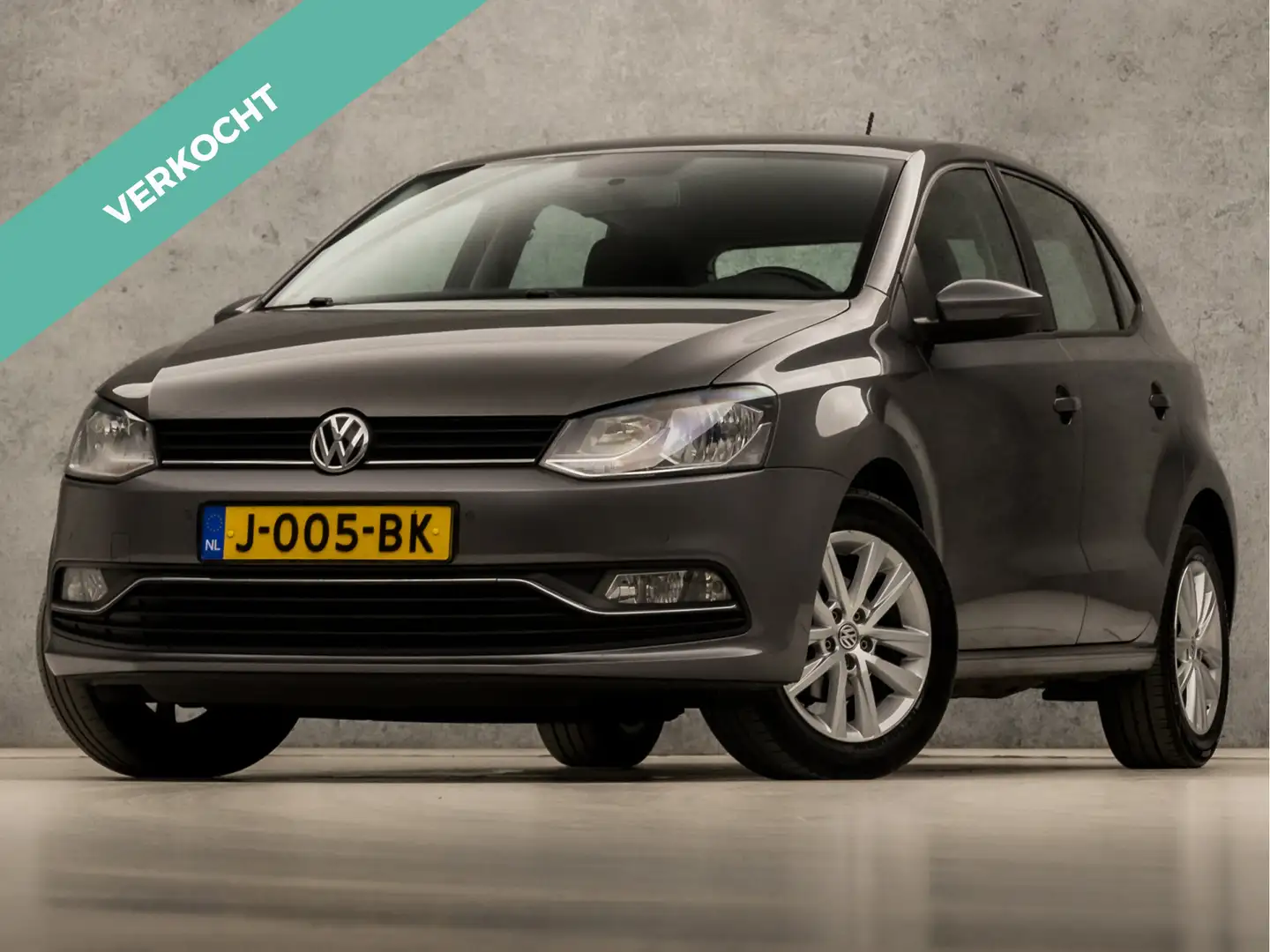 Volkswagen Polo 1.0 Sportline (SCHERM, CRUISE, PARKEERSENSOREN, LM Gris - 1