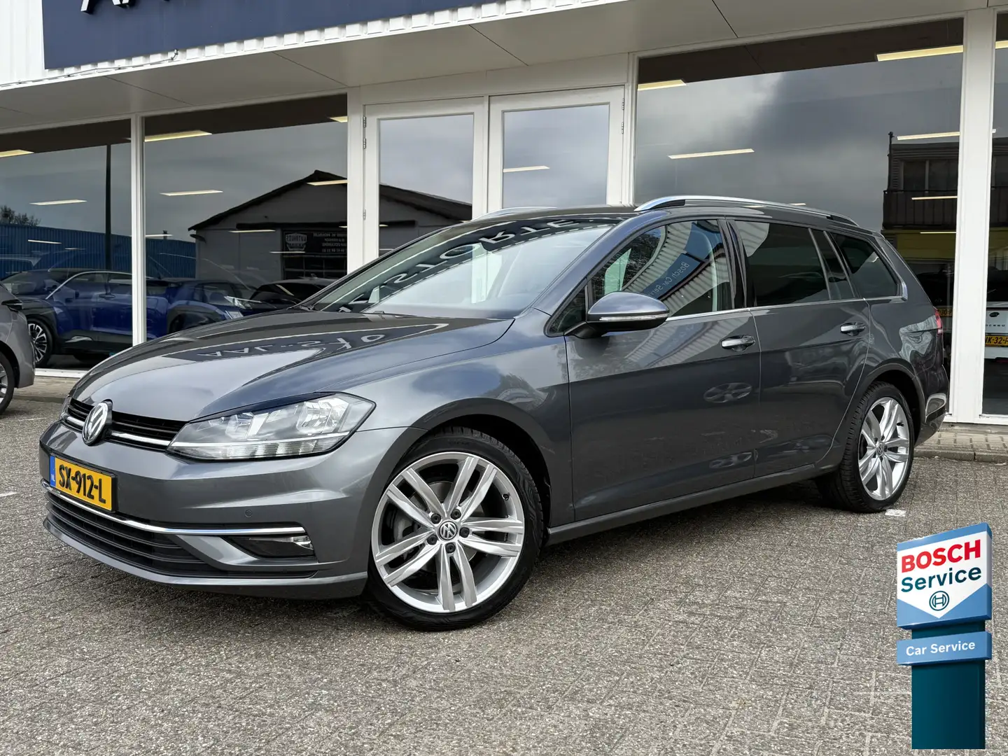 Volkswagen Golf Variant 1.5 TSI 150pk Highline | Navi | Apple Carplay | Ad Grau - 1