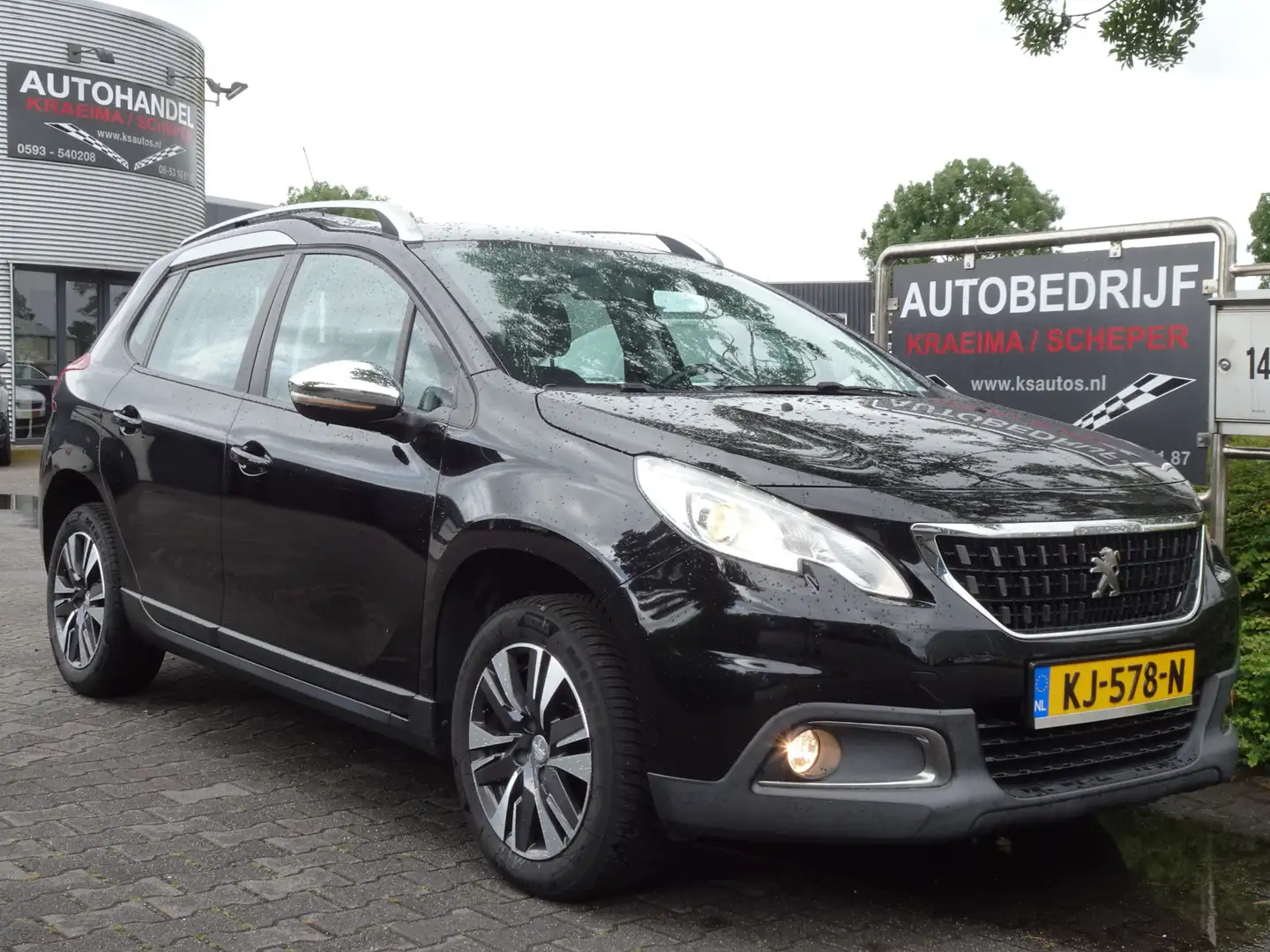 Peugeot 2008 1.2 PureTech Blue Lion Autom. Zwart - 1