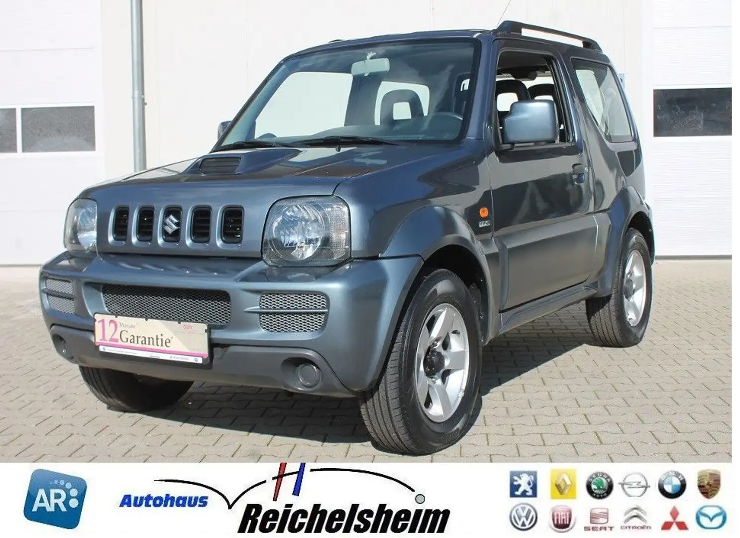 Suzuki Jimny Tüv/Au neu,wenig Km,Diesel,AHK,Finanz. Grau - 1