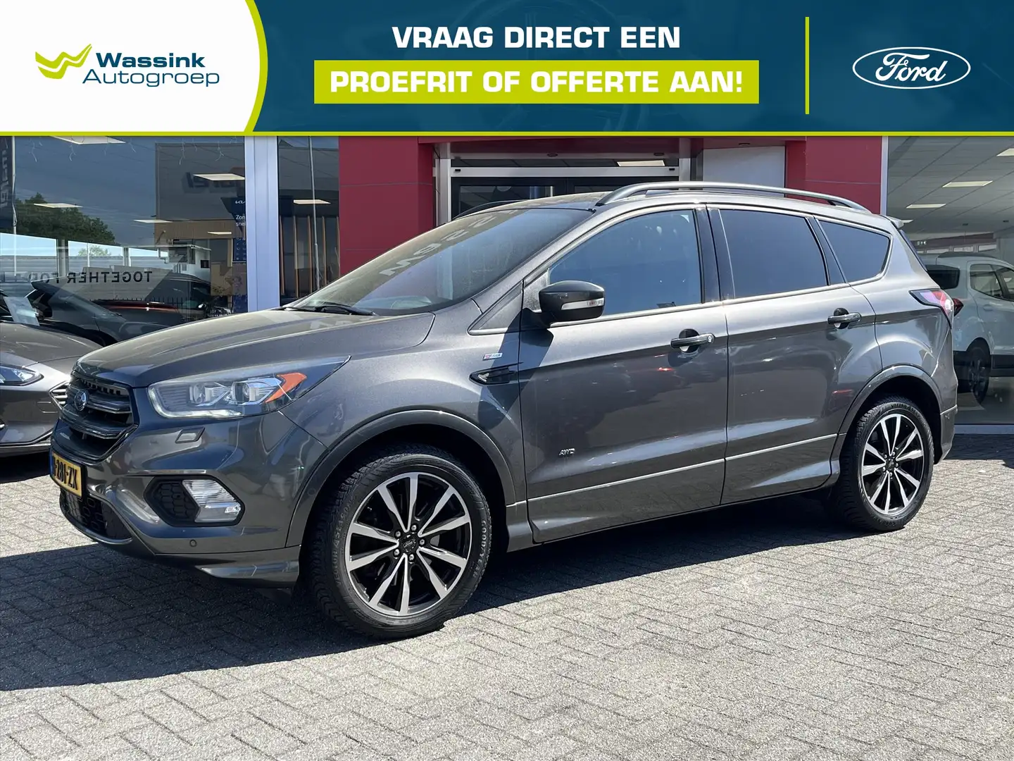 Ford Kuga 1.5 EcoBoost 182PK 4WD AUT ST Line | Winterpakket Grau - 1