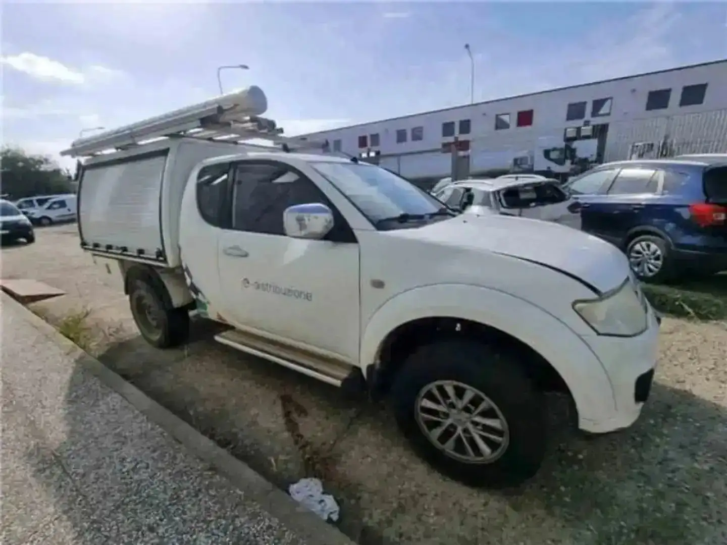 Mitsubishi L200 d.cab 2.5 di-d Intense Plus 178cv N1 E5 - EV365JM Alb - 2