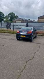 Opel Tigra 1.4 2008 Cabrio zwart met rood leder