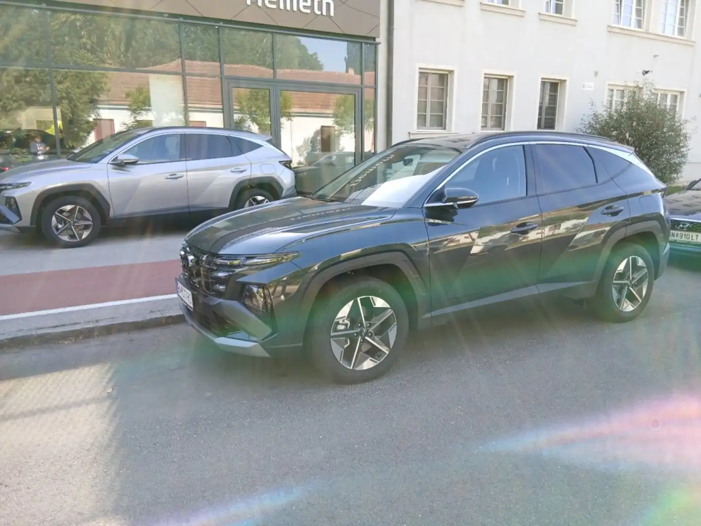 Hyundai TUCSON NX4 Comfort Line 1,6 T-GDi HEV 2WD AT t7hc1-P22 Schwarz - 1