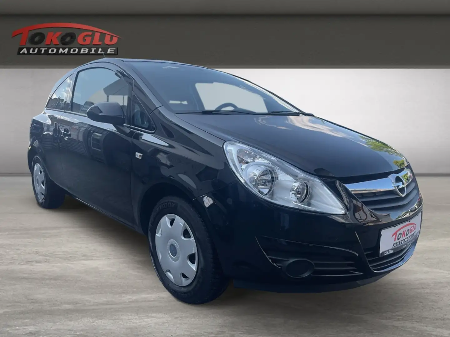 Opel Corsa D Edition 1.2 PDC Klima el.SP teilb.Rücksb CD met. Negro - 1