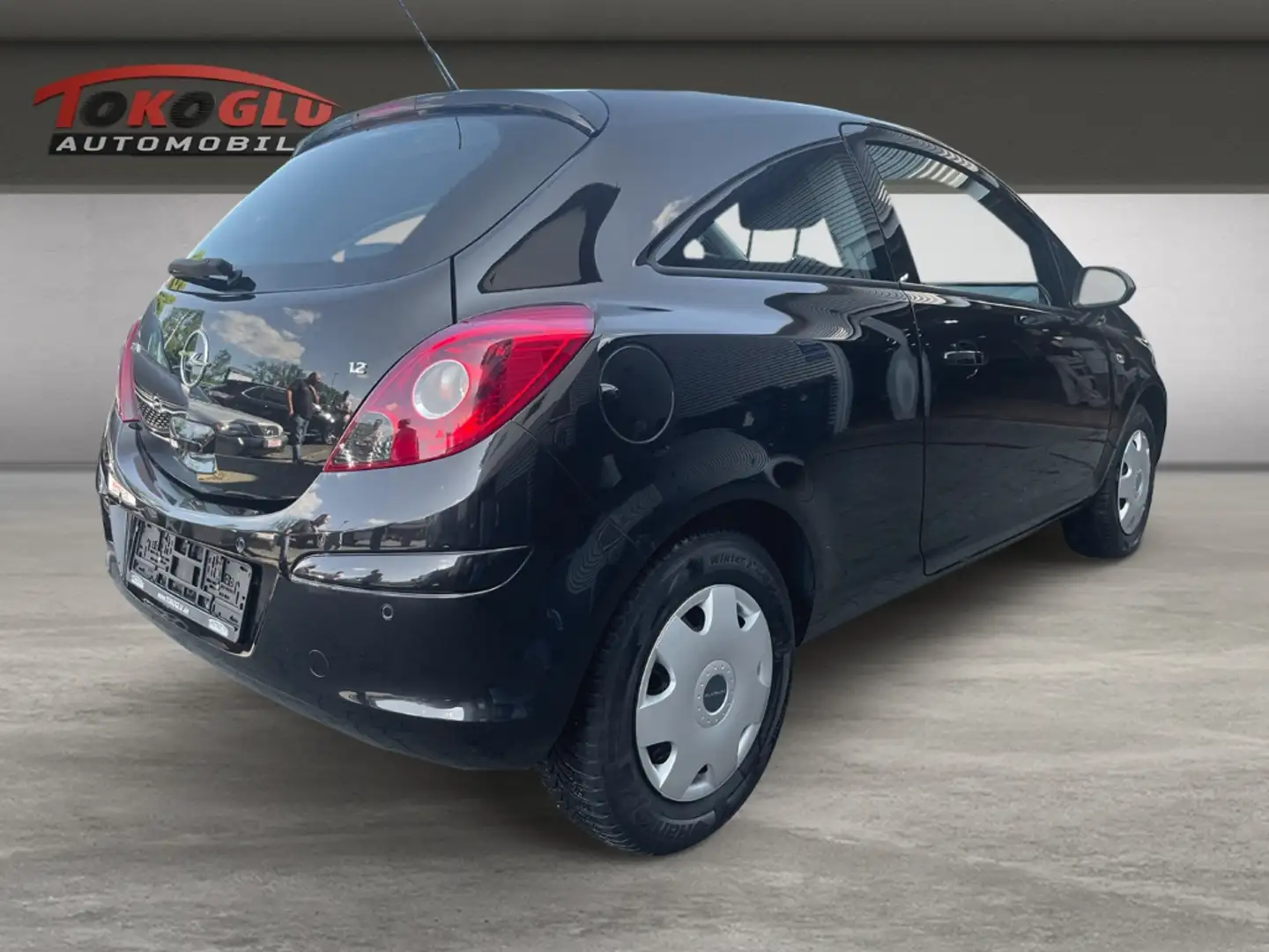 Opel Corsa D Edition 1.2 PDC Klima el.SP teilb.Rücksb CD met. Negro - 2