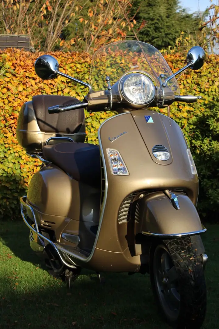 Vespa GTS 125 Золотистый - 2