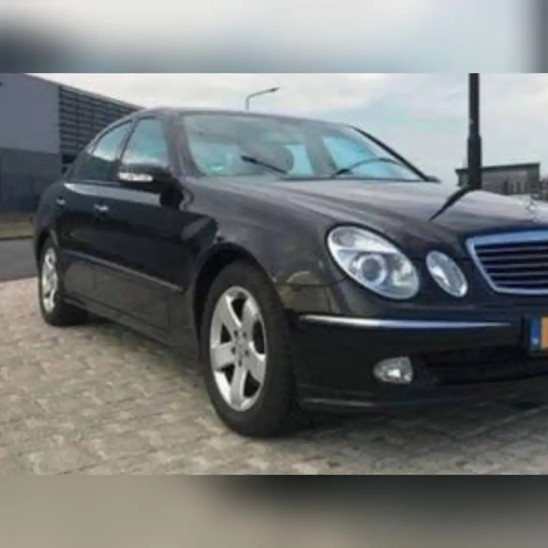 Mercedes-Benz E 320 Avantgarde | 75.500 km | 2004 | E320 Zwart - 1