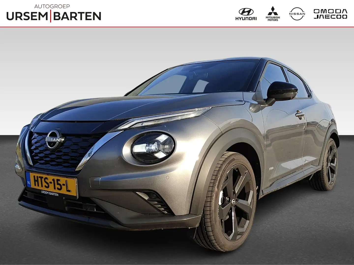 Nissan Juke 1.6 Hybrid Tekna Grijs - 1