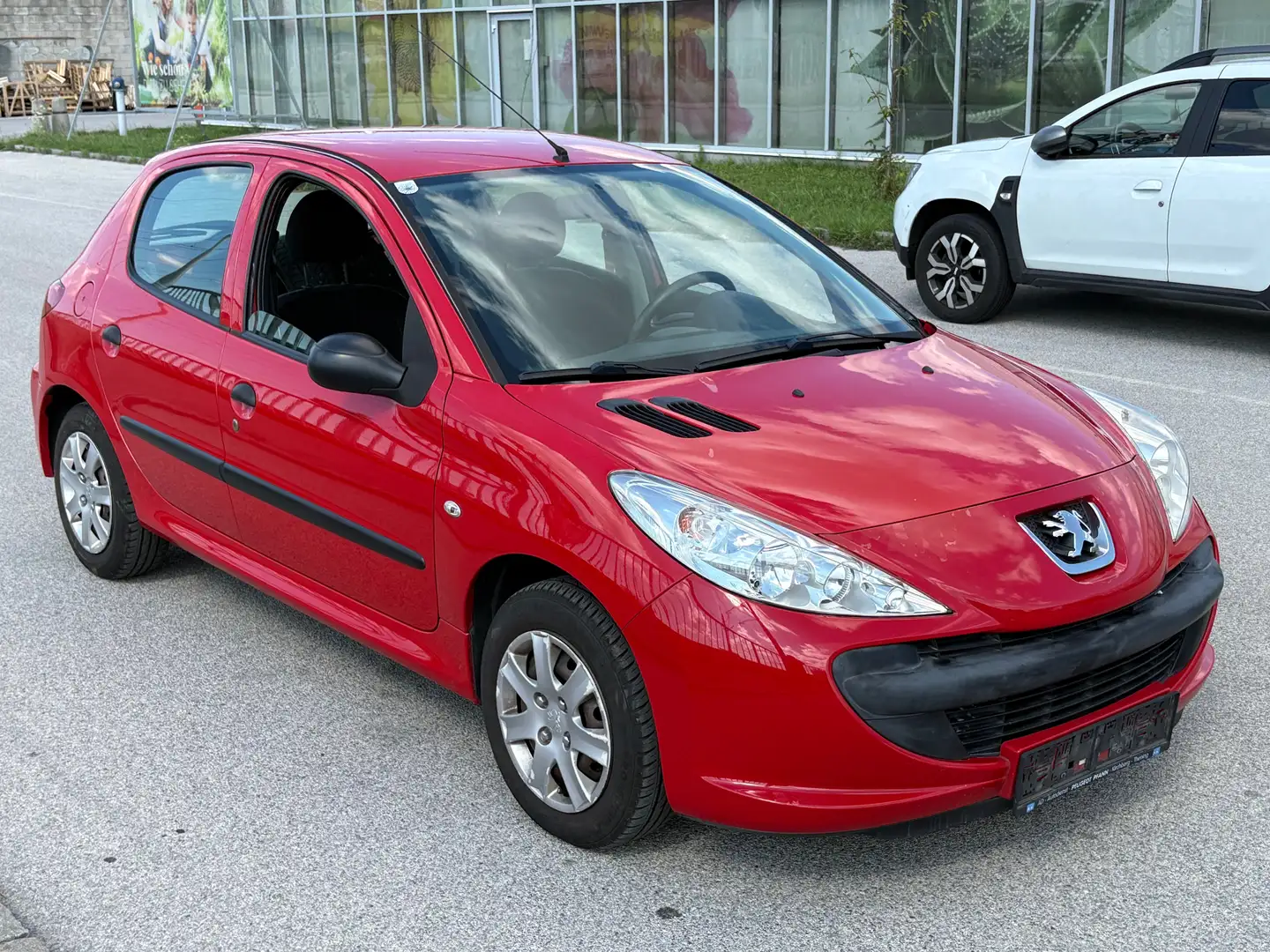 Peugeot 206 206+ Junior 1,1 Junior Rouge - 1