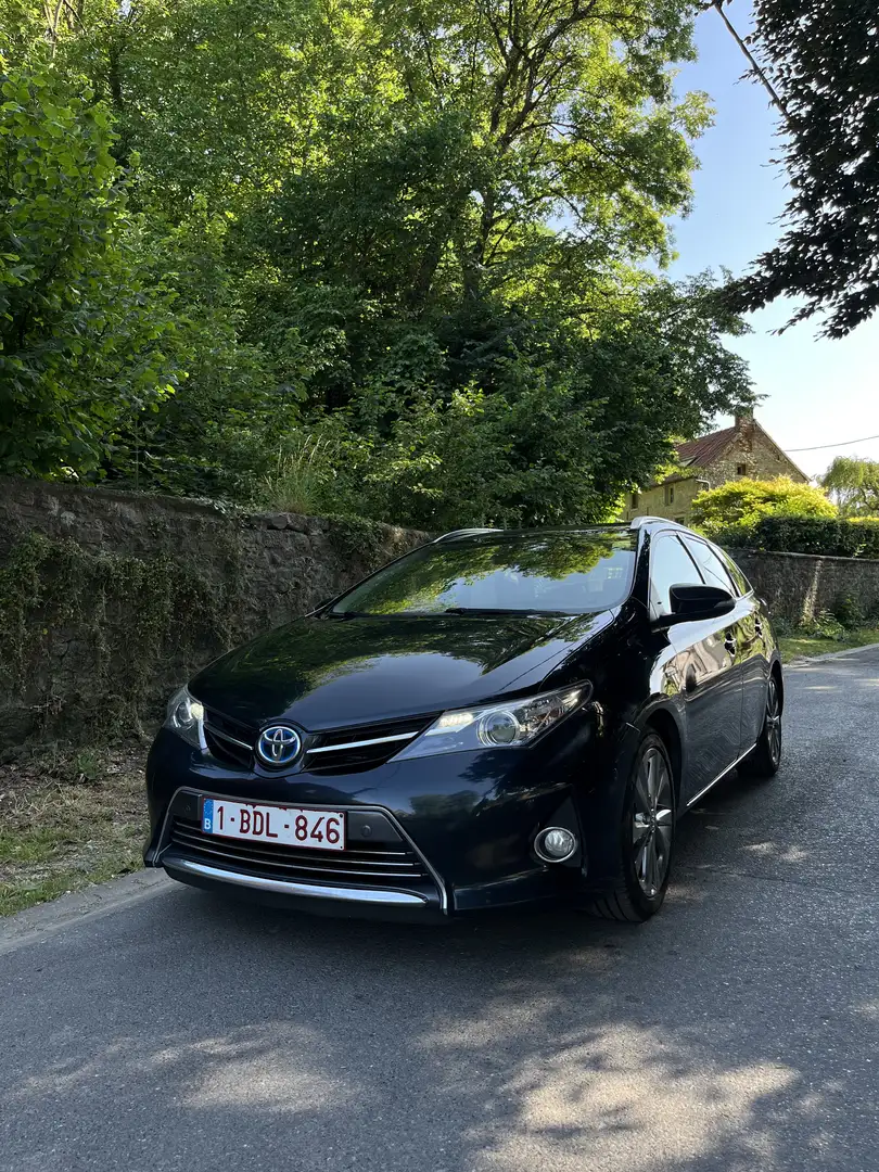 Toyota Auris 1.8 Hybrid / Carnet complet Toyota / Parfait état - 1