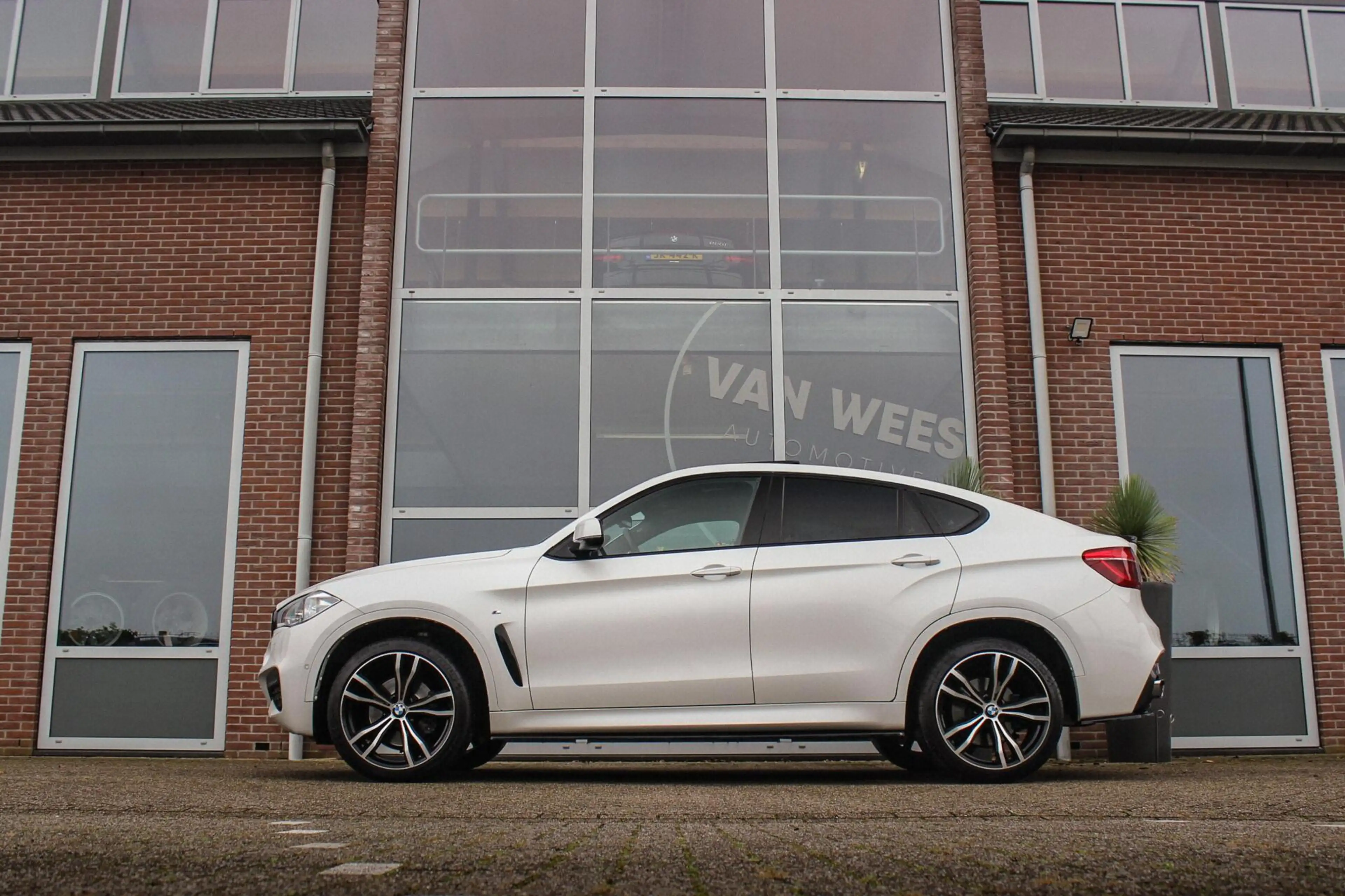BMW X6 xDrive35i High Executive | M Sportpakket | Driving — photo 6