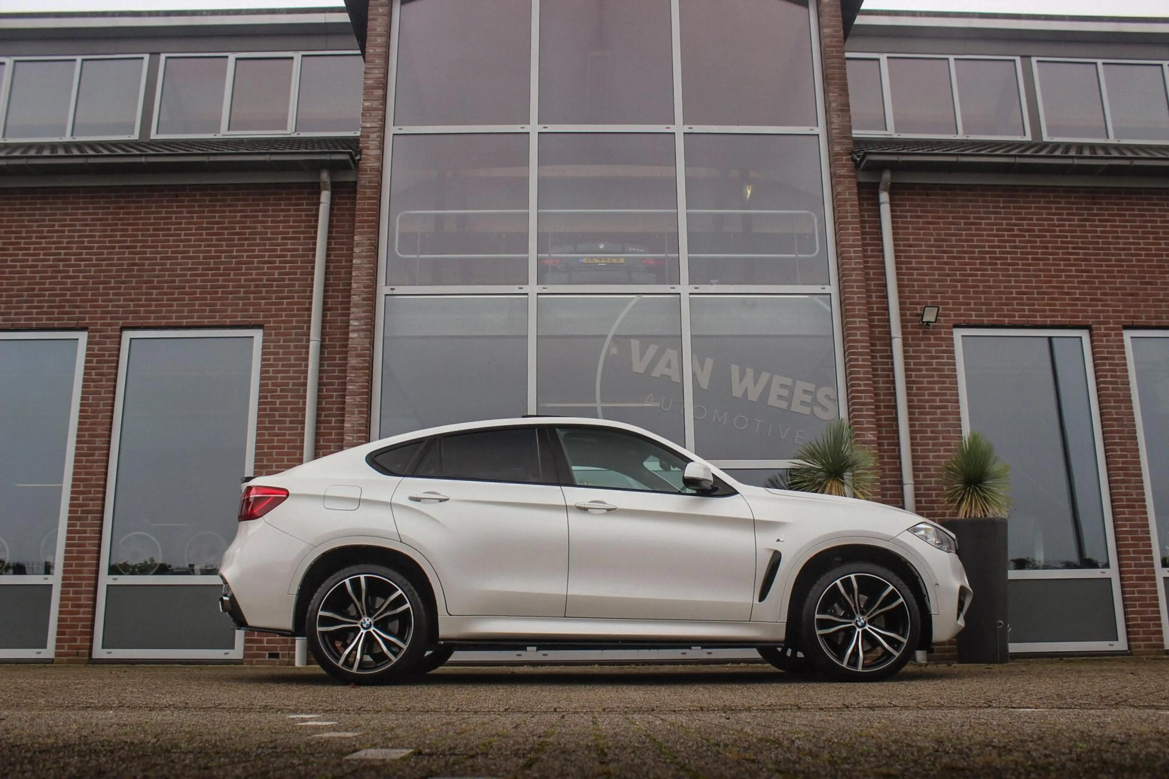 BMW X6 xDrive35i High Executive | M Sportpakket | Driving — photo 7