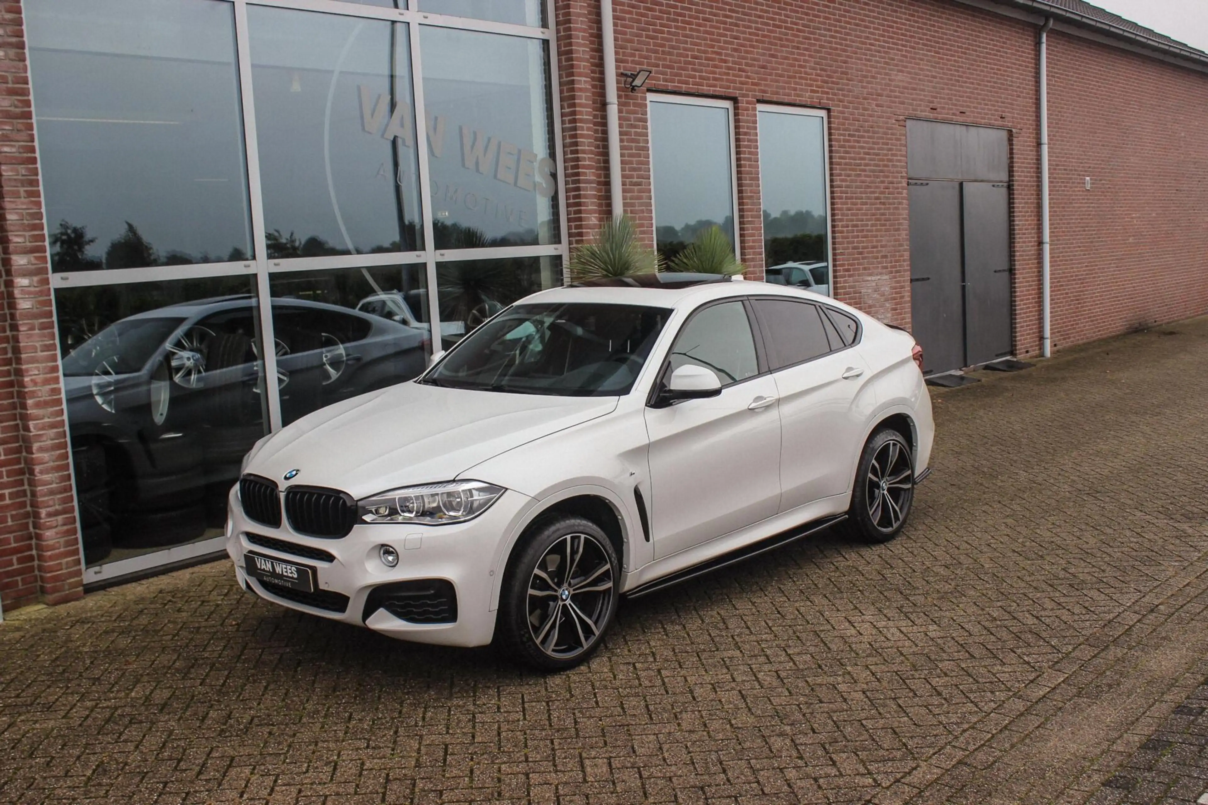 BMW X6 xDrive35i High Executive | M Sportpakket | Driving — photo 8