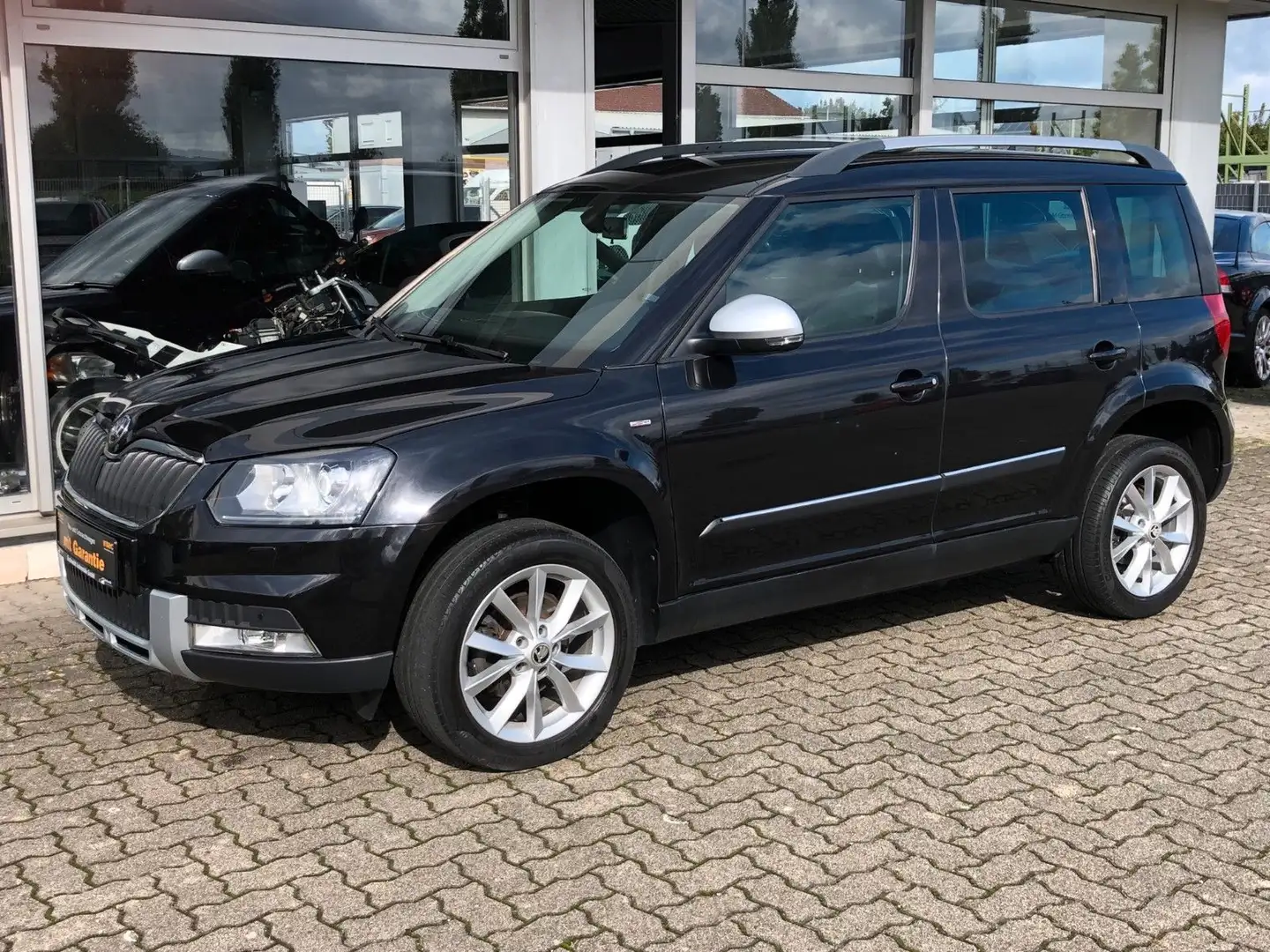Skoda Yeti 1.4 TSI Ambition Outdoor 4x4 DSG Xenon AHK Schwarz - 1