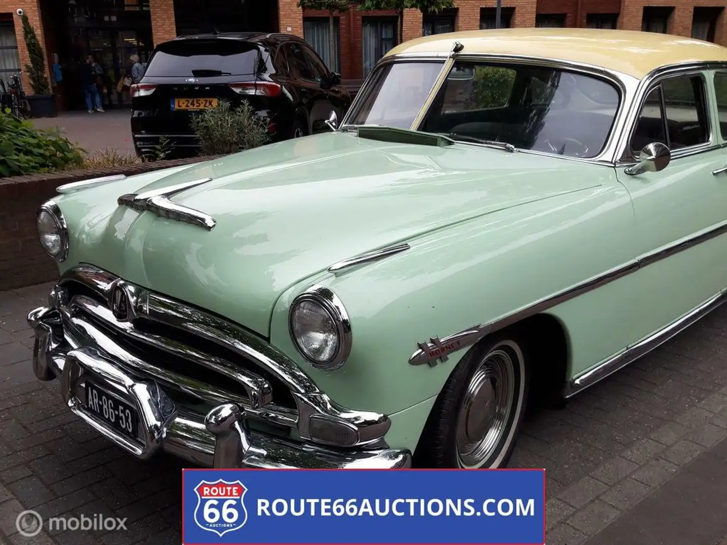 Oldtimer Hudson Hornet Sedan | Route 66 Auctions Groen - 1