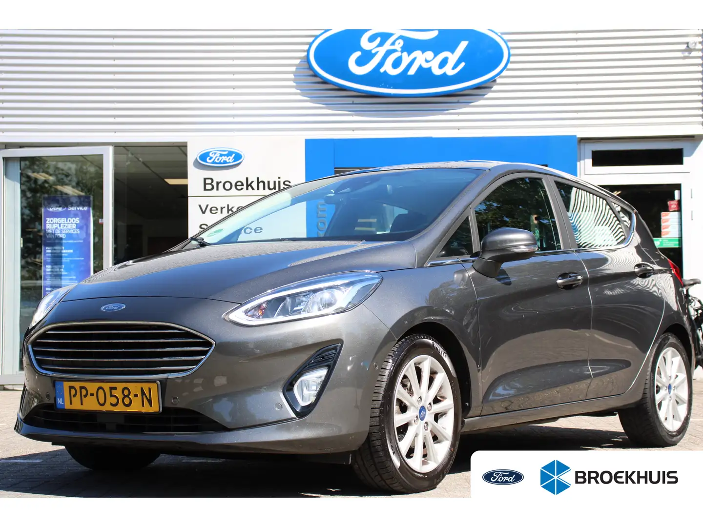 Ford Fiesta 1.0EB TITANIUM | ORIGINEEL NL! | 1 EIGENAAR! | B&O Grijs - 1